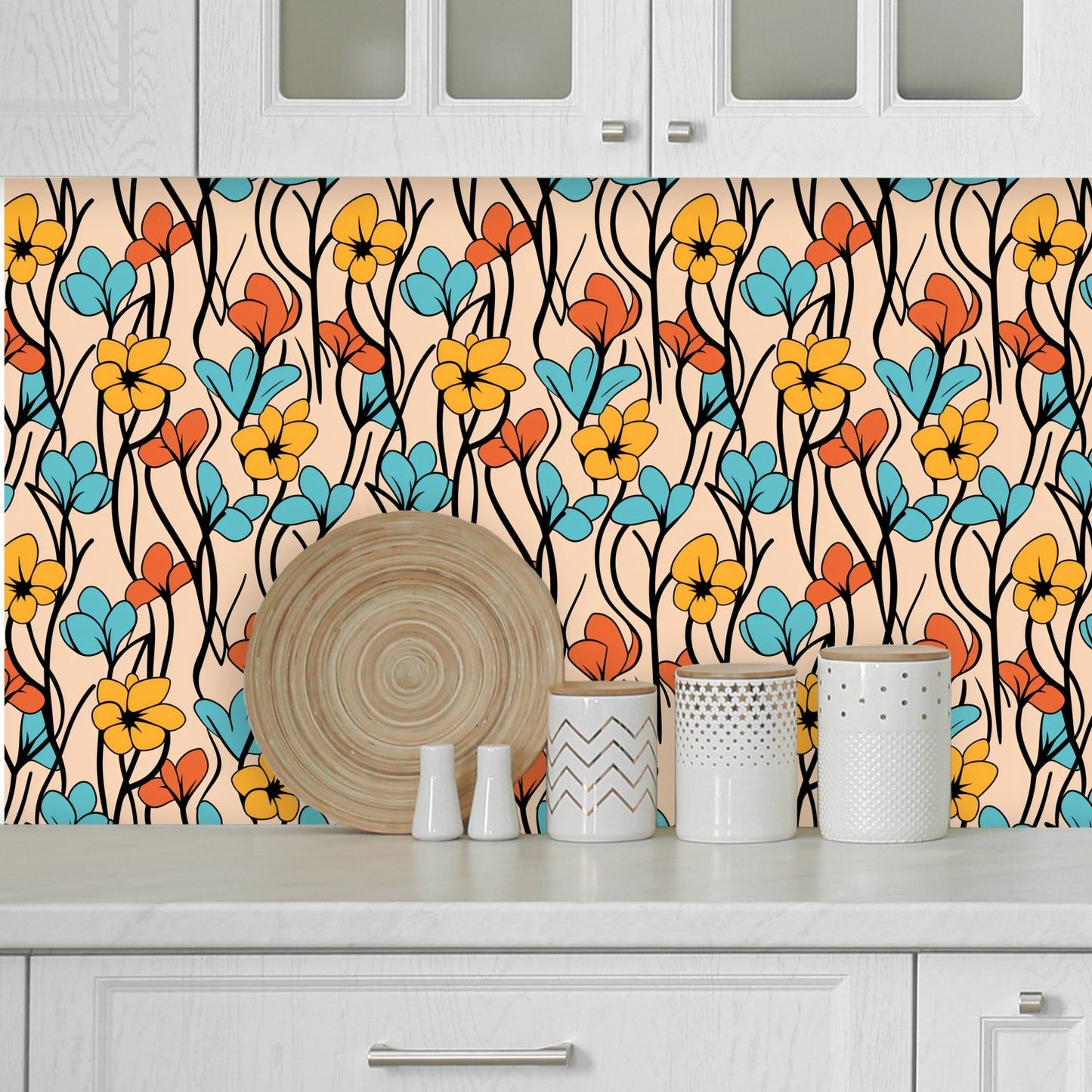 Colorful floral patterned wallpaper or backsplash with yellow, orange, and blue flowers on a light background.