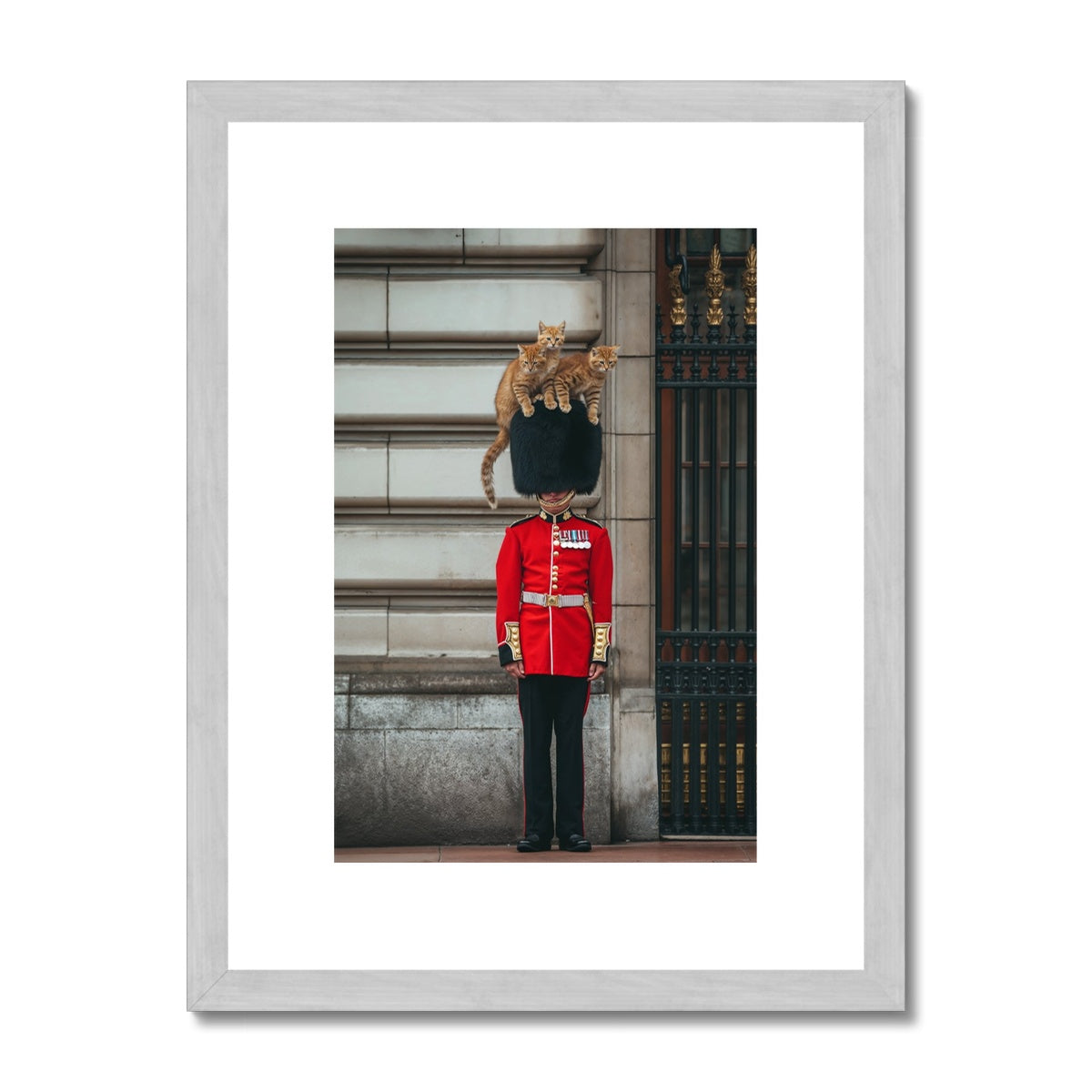 Royal Guard in traditional red and black uniform with bearskin hat standing at attention.