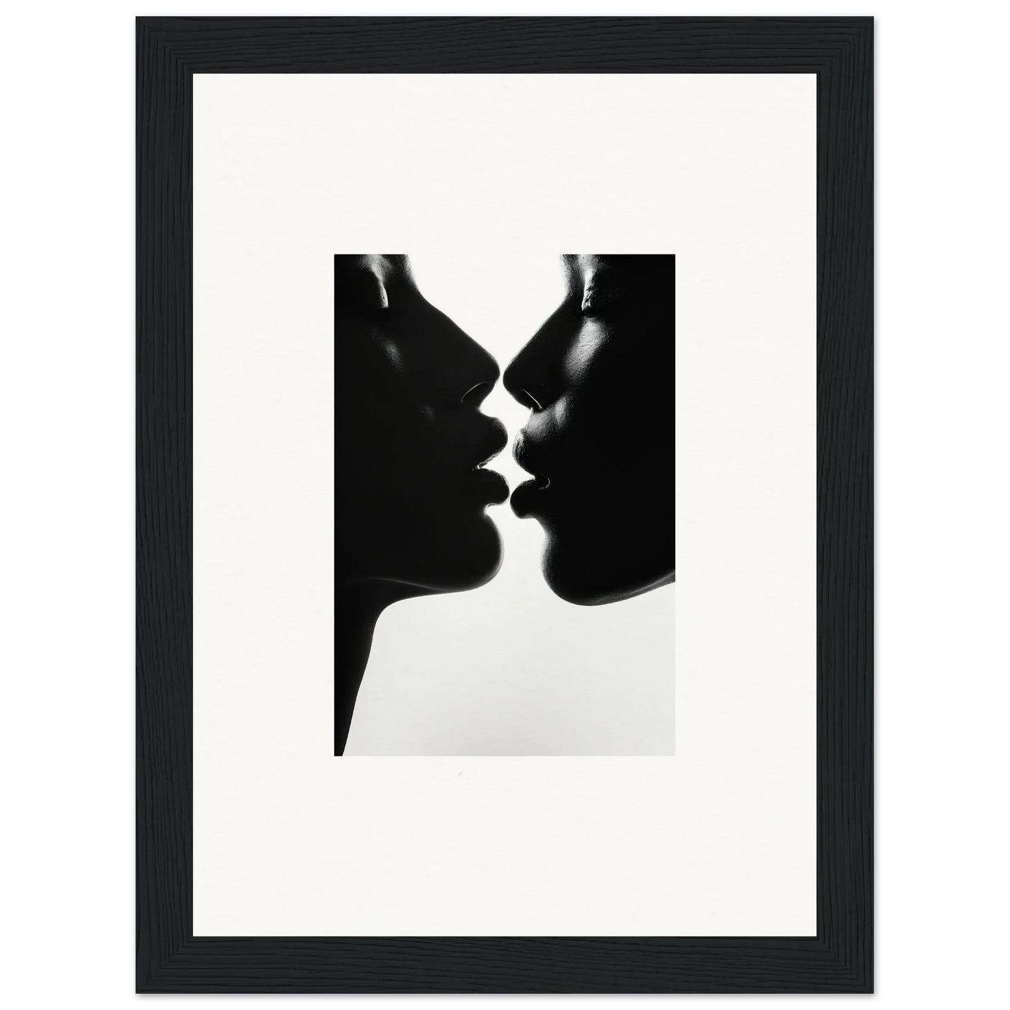 Two silhouetted profiles about to kiss in Luminous Midnight Kiss framed wall art