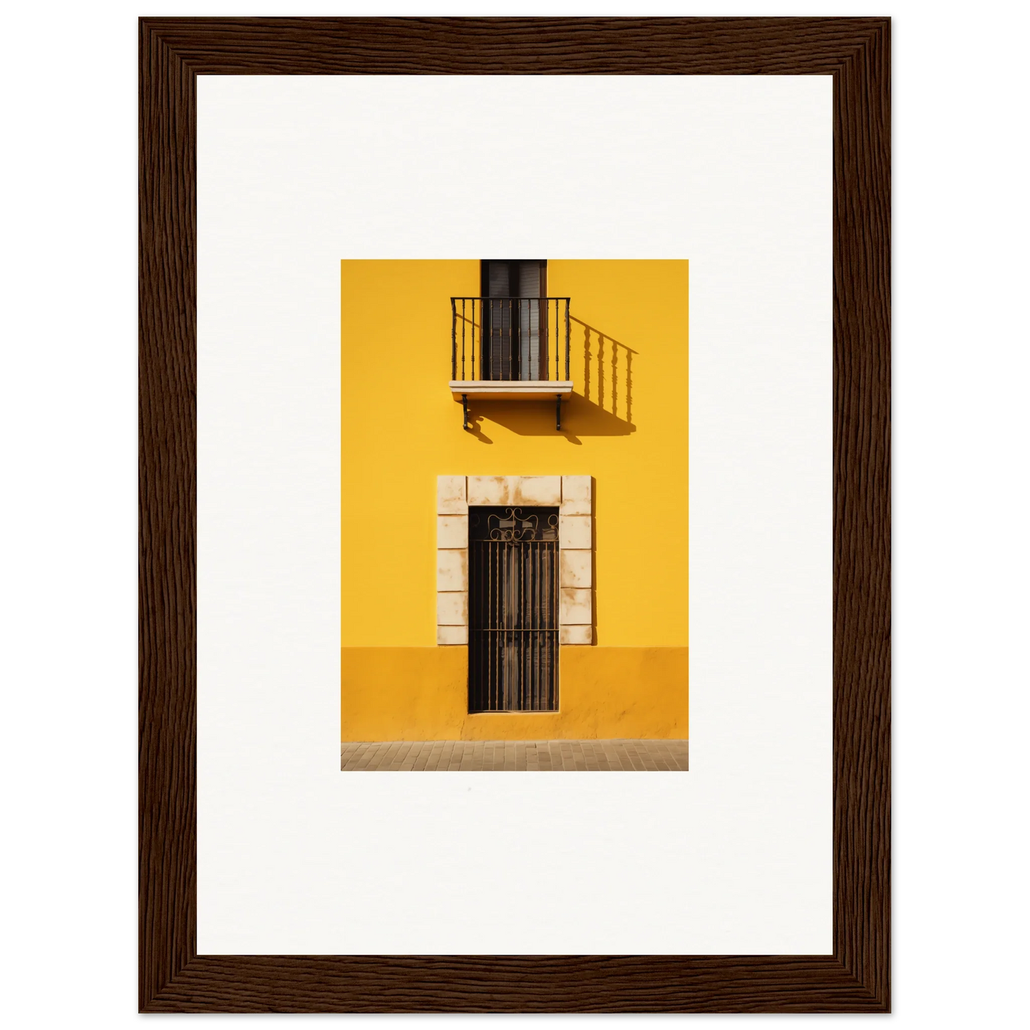 Framed art of a yellow building with a black door from Sun Custard Symphonies