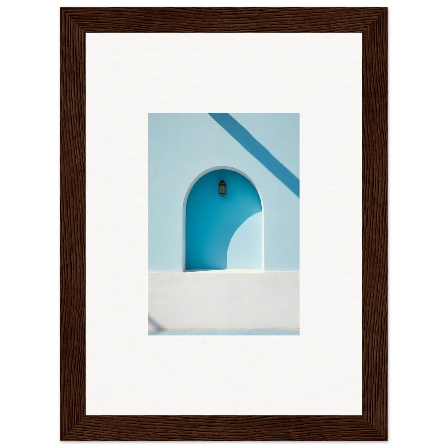Framed wall art of a blue arched doorway, perfect for elusive solitude clarity vibe
