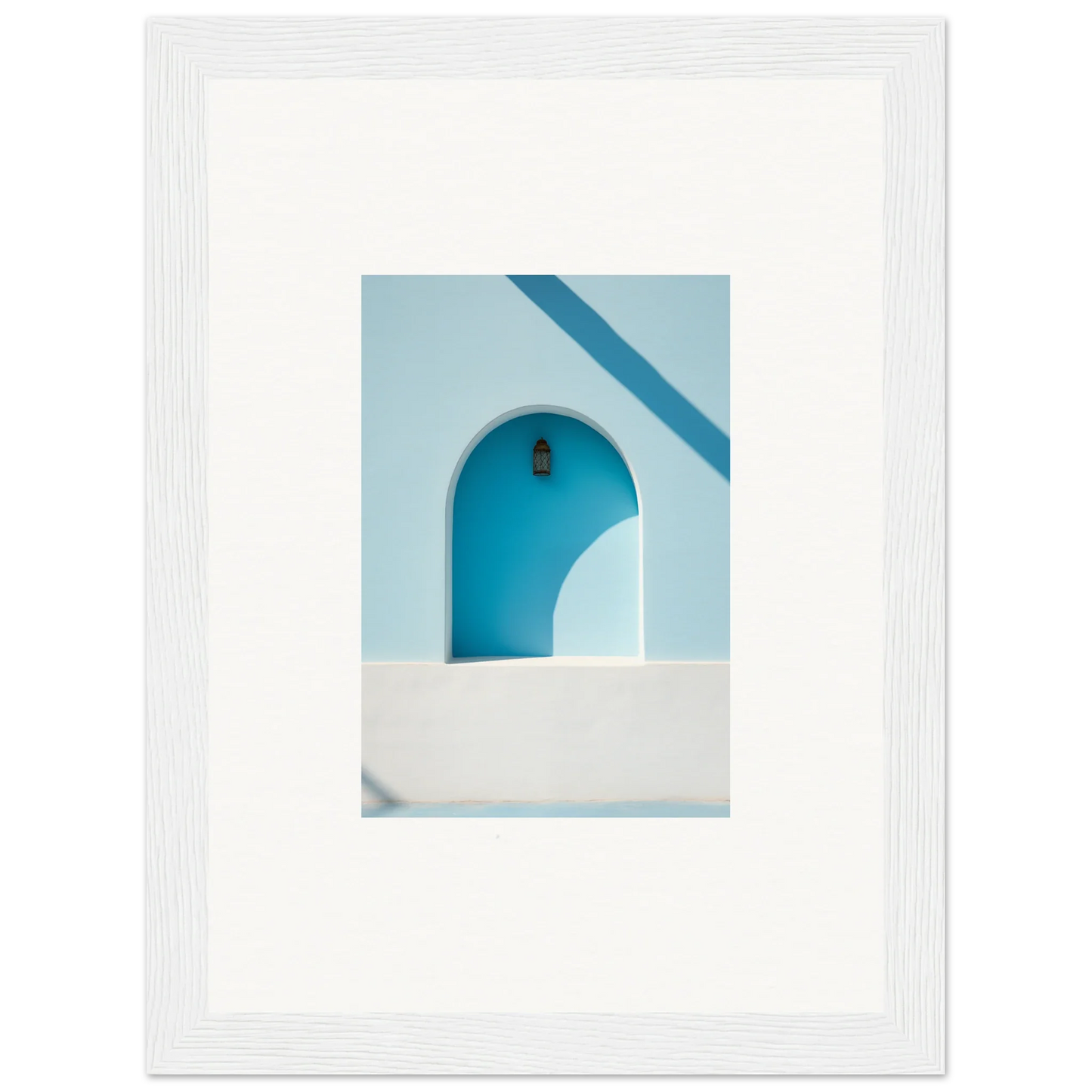 Turquoise arched doorway with white walls and a black lamp in Elusive Solitude Clarity
