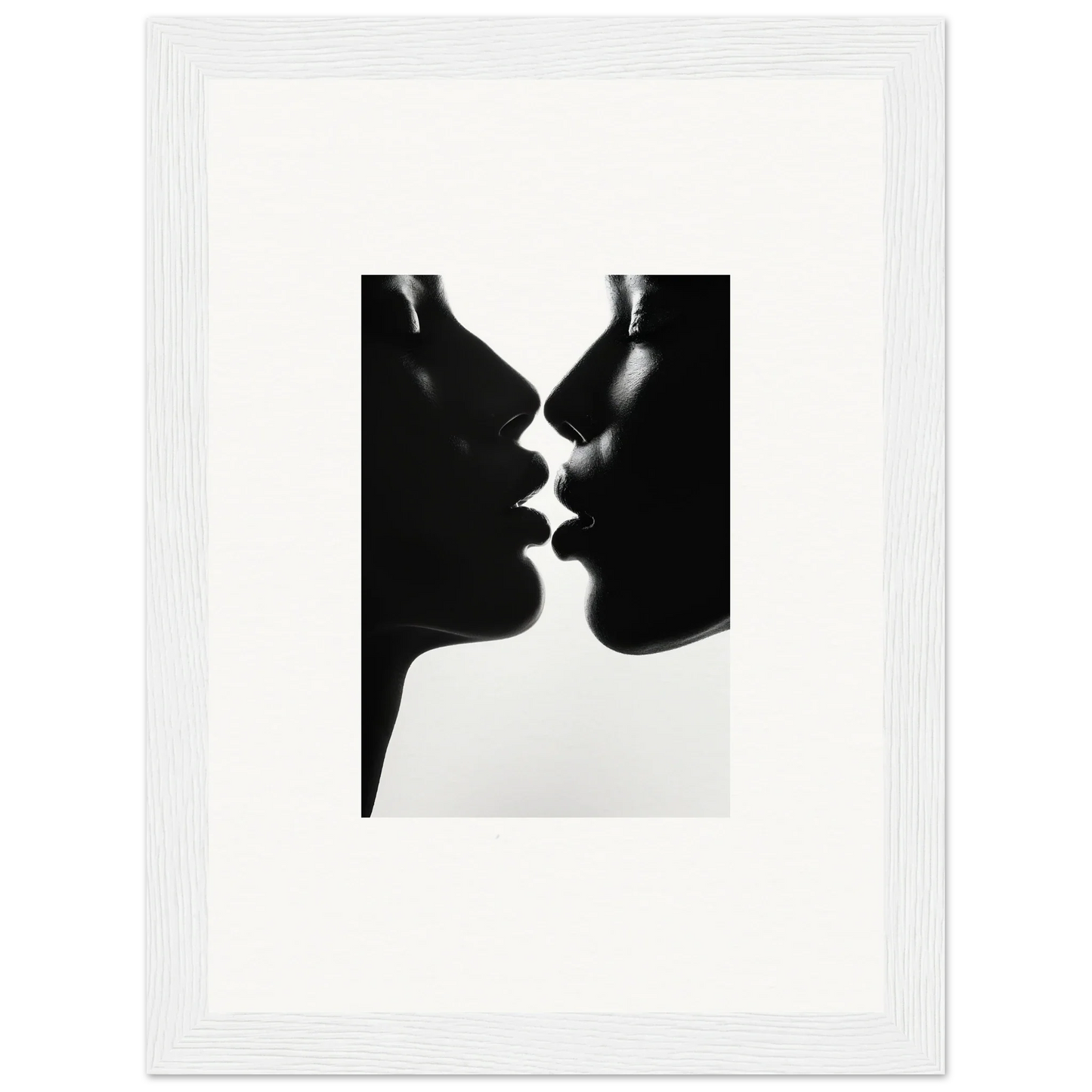 Silhouettes of two profiles about to kiss in Luminous Midnight Kiss framed wall art