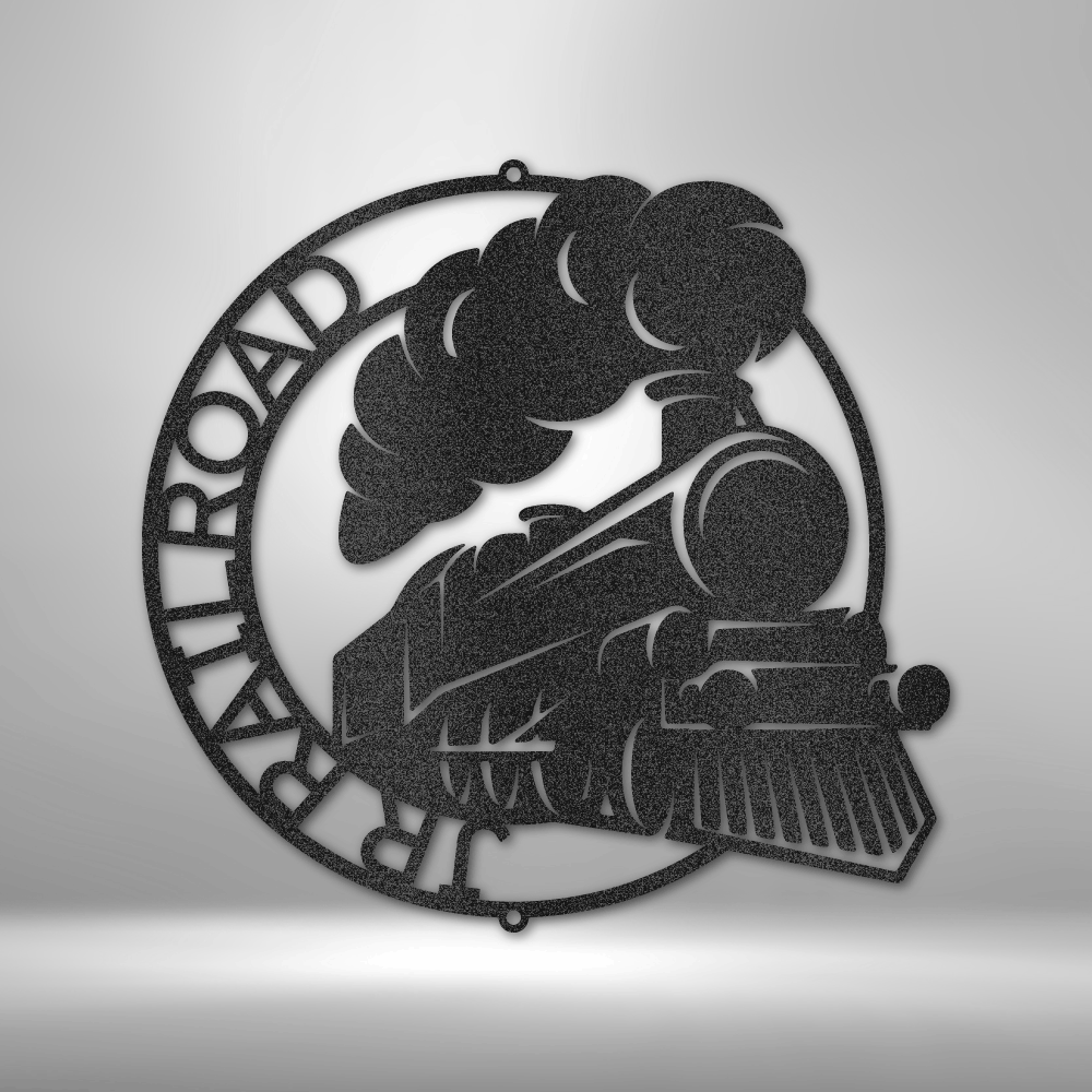 Circular metal wall art depicting a steam locomotive with billowing smoke.