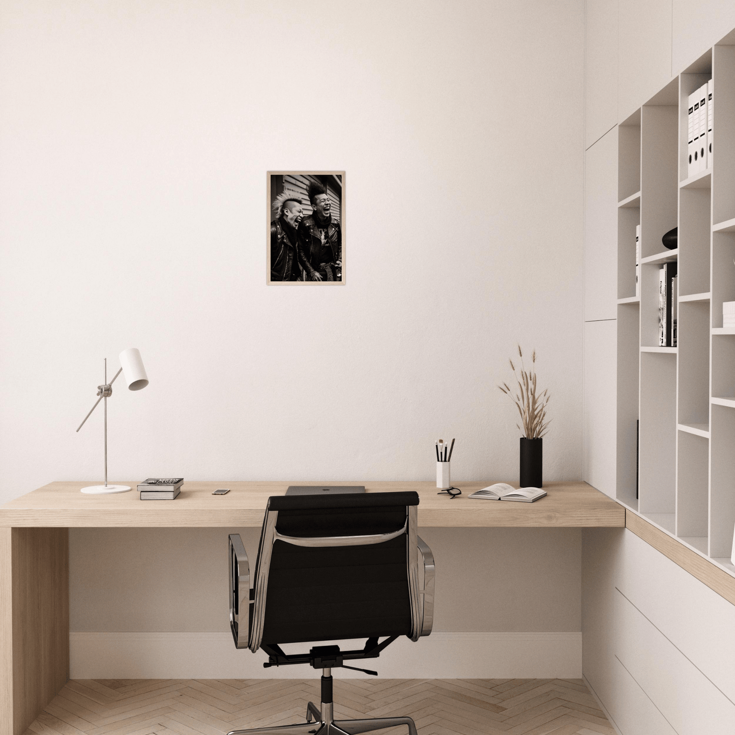 Minimalist wooden desk with a black office chair in a clean, white workspace.
