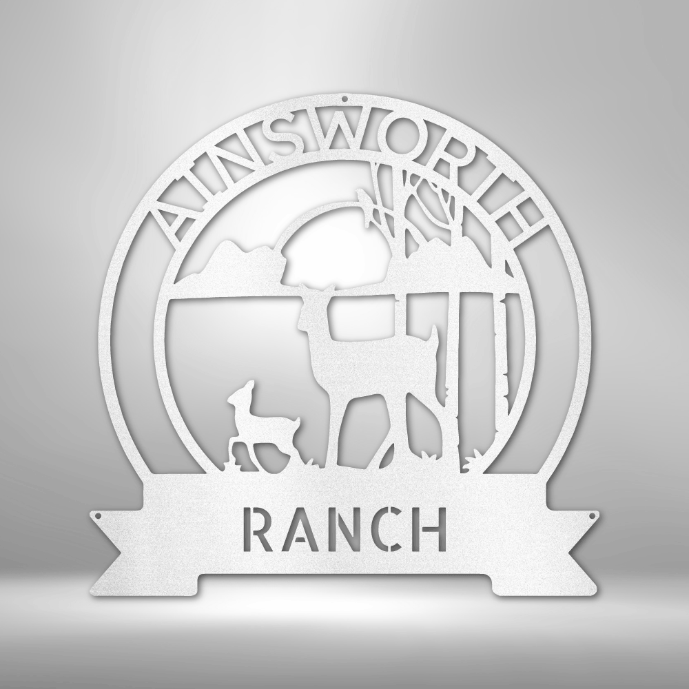 Circular logo design for ’Ainsworth Ranch’ featuring silhouettes of deer and trees.