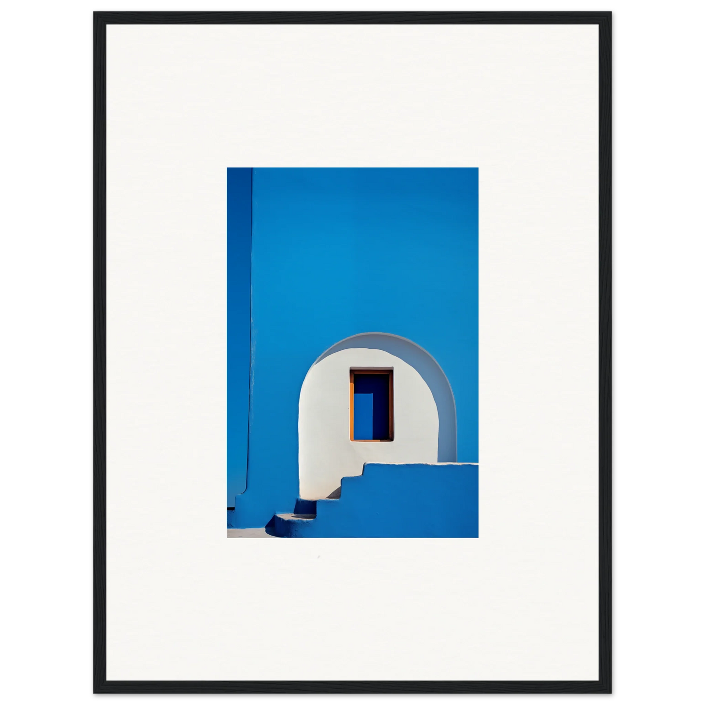 White arched doorway with steps on vibrant blue in Dreams’ premium framed wall art