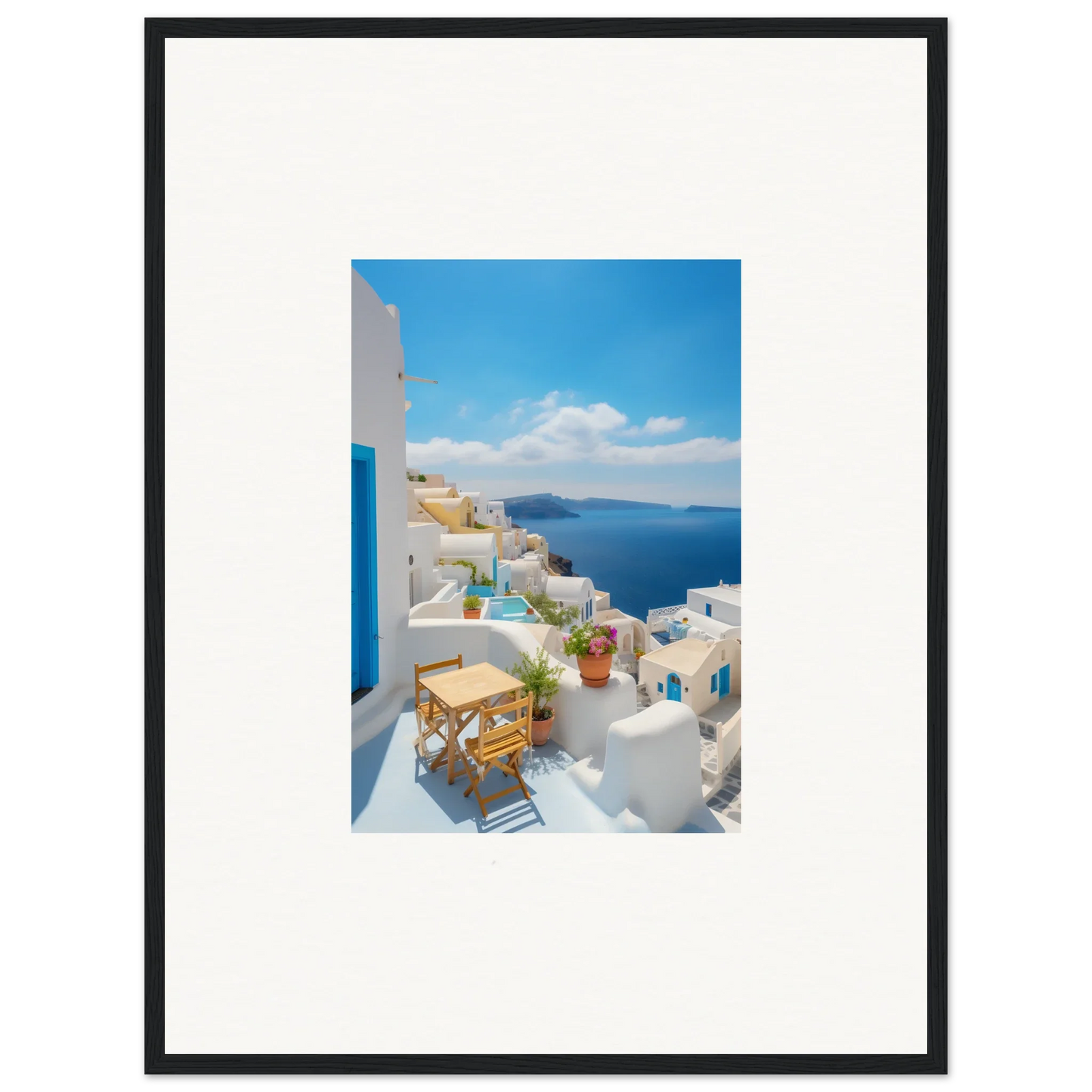 Framed poster of Santorini’s white buildings and blue sea in Dream-Touched Odyssey art