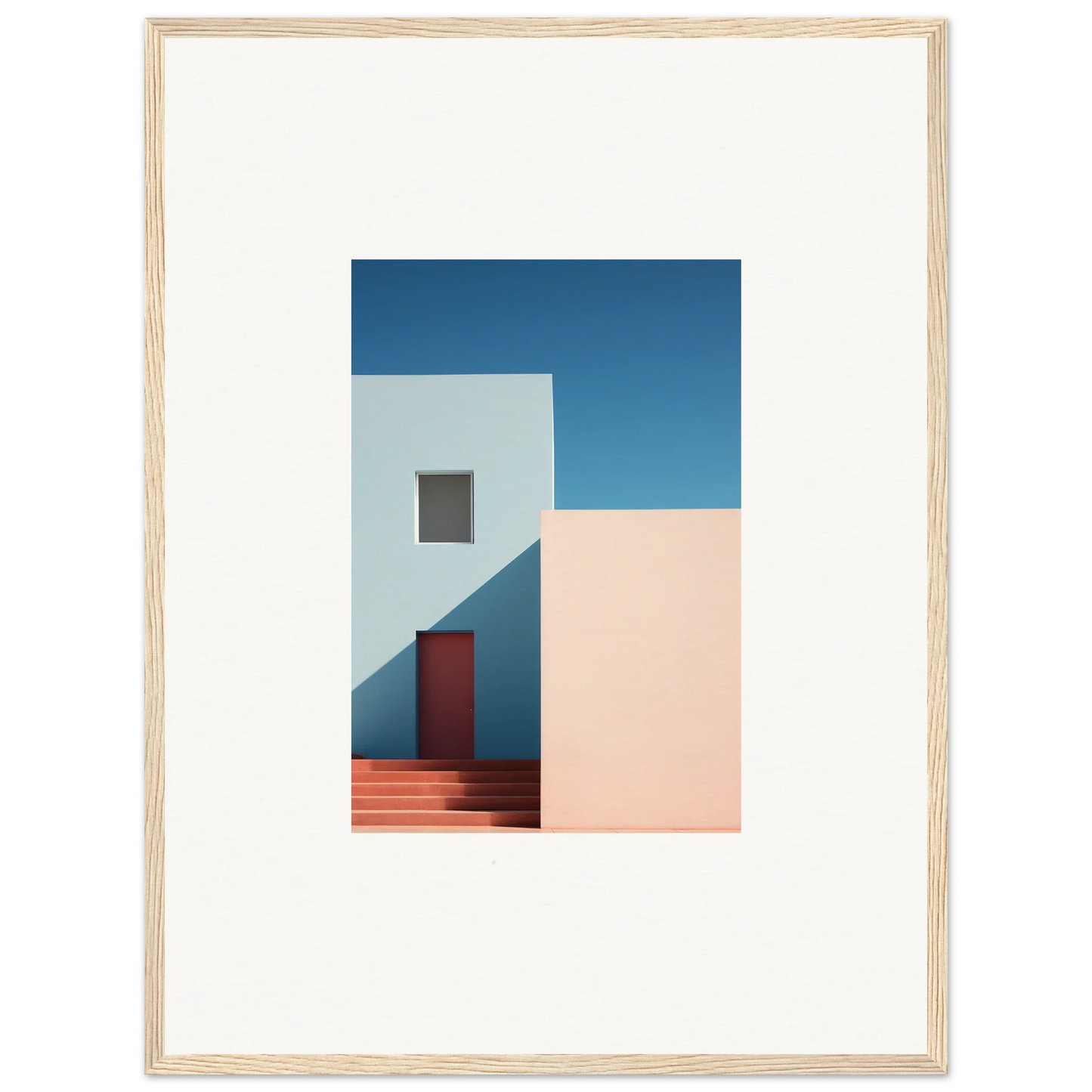 Minimalist white building with red door against blue sky in special edition art™
