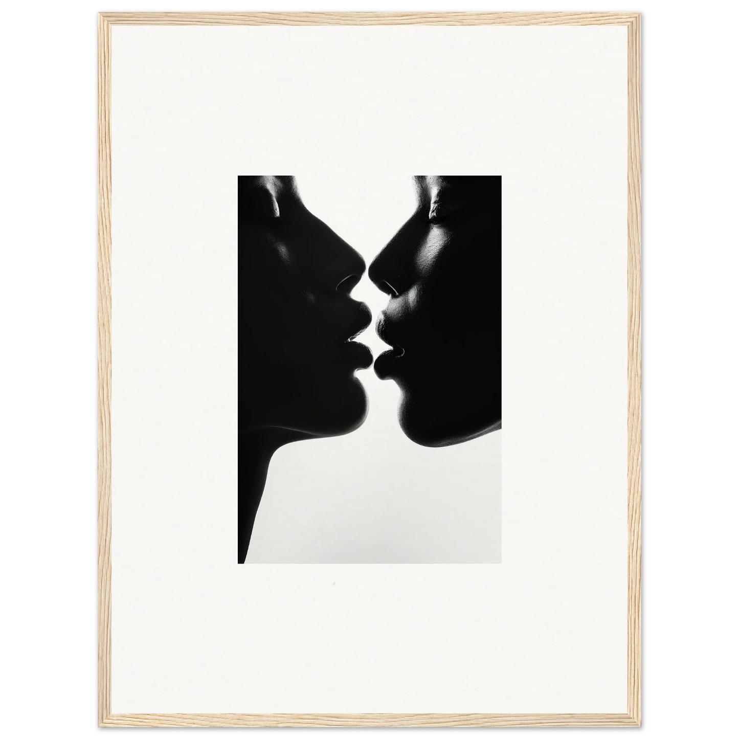 Black and white silhouette of two profiles about to kiss, Luminous Midnight Kiss art
