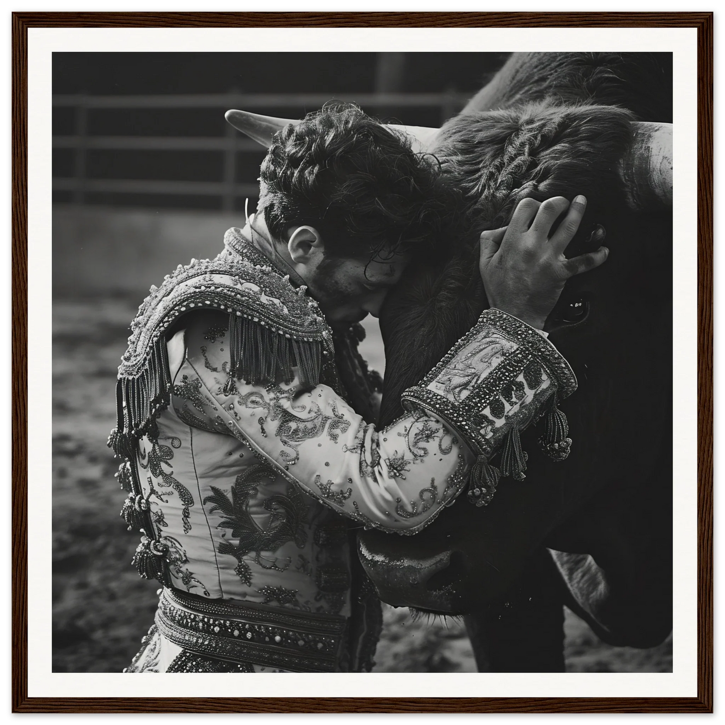 A matador in an ornate jacket embracing a bull in Bullring Reverie Communion art