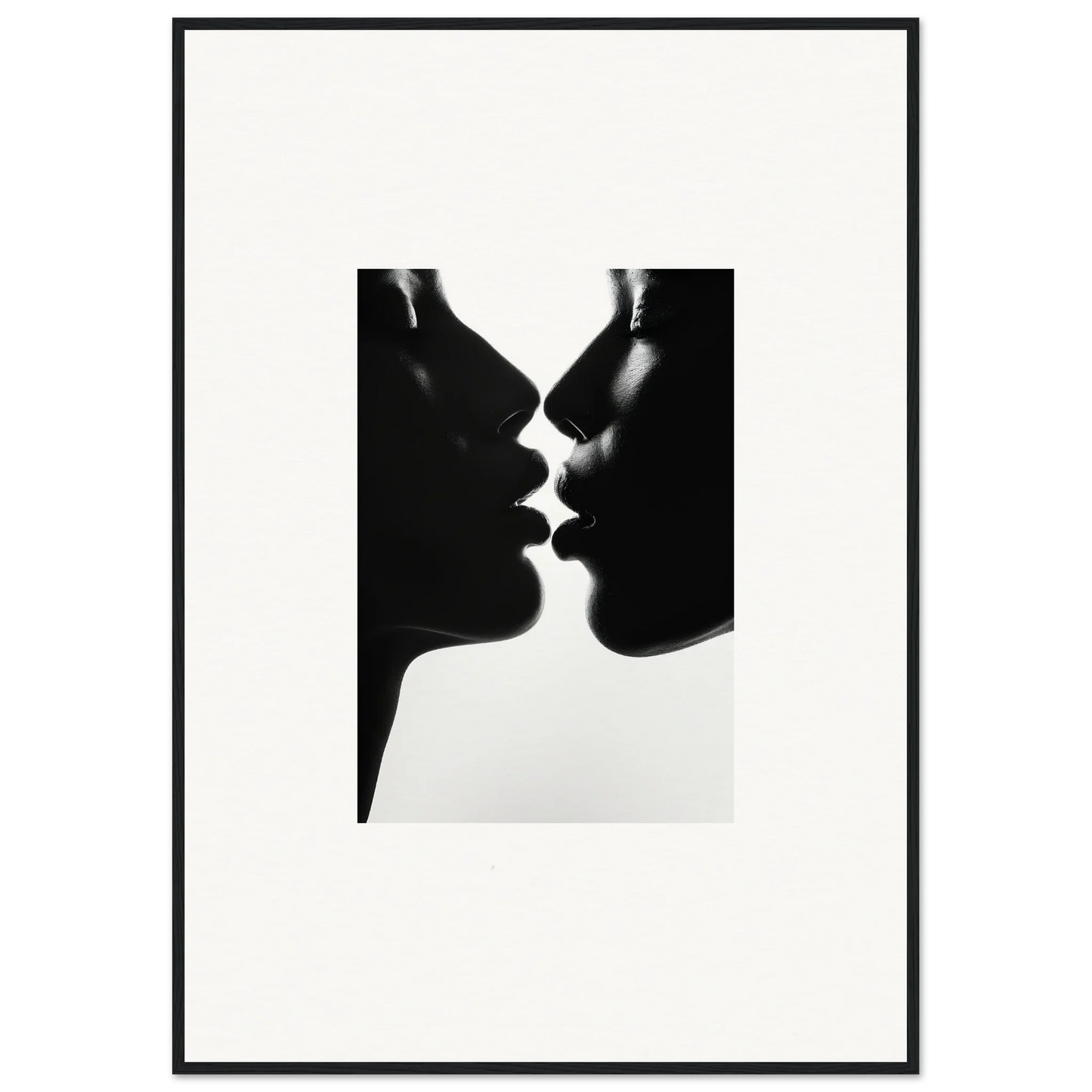 Two silhouetted profiles about to kiss in black and white for Luminous Midnight Kiss