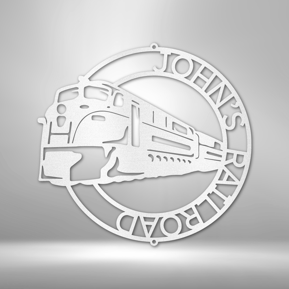 Circular white metal sign featuring a stylized train locomotive design and text reading ’JOHN’S RAILROAD’.