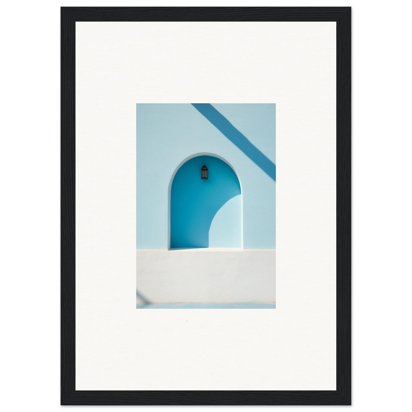 Framed wall art of a blue arched doorway in Elusive Solitude Clarity style
