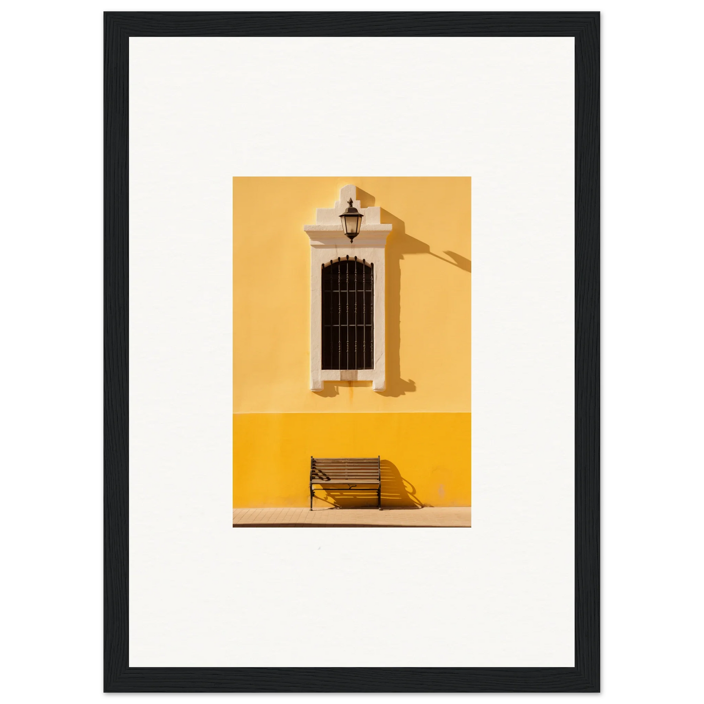Black-framed photograph of a yellow wall, window, and bench from Six-Light Cult Optionsky