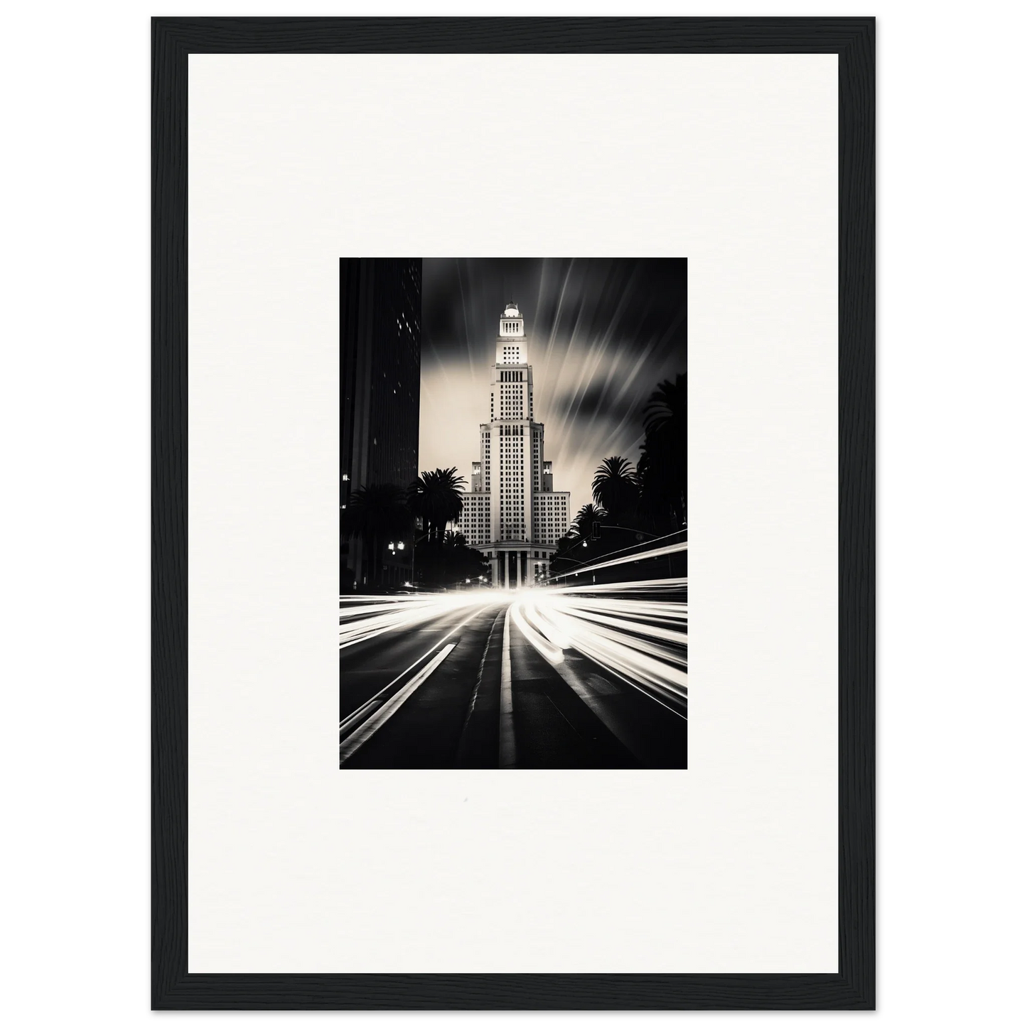 Art Deco skyscraper lit at night with light trails in Luminescent Metropolis Beacon framed poster