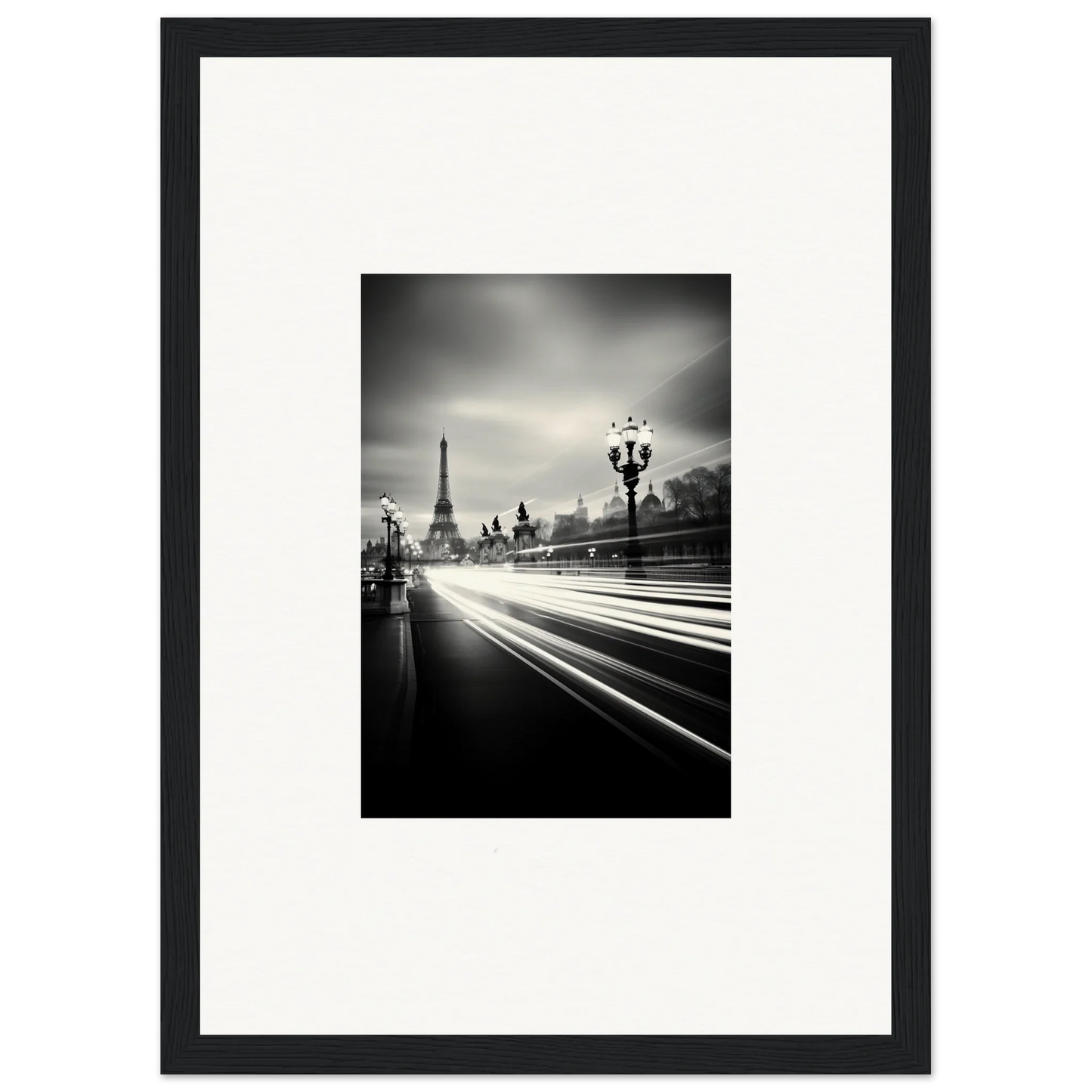 Black and white Eiffel Tower photo with light trails, perfect for special edition art™