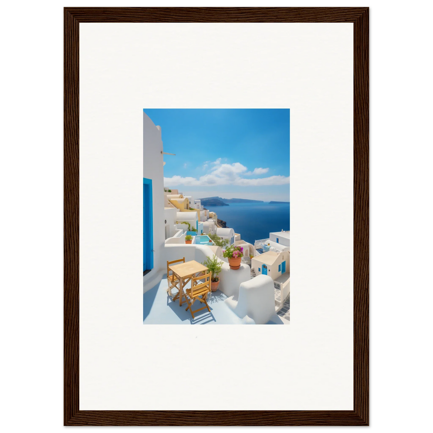 Framed poster of Santorini’s white buildings and blue sea from Dream-Touched Odyssey