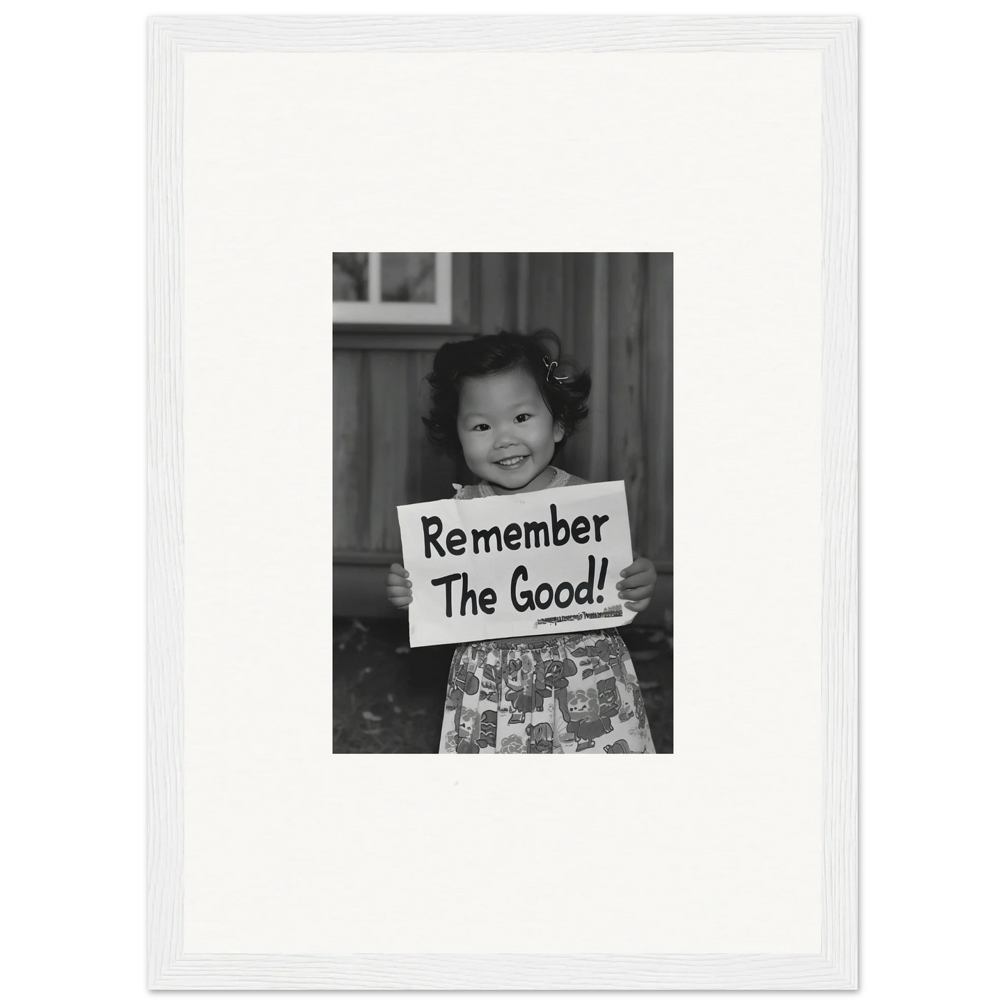 Smiling child with Remember The Good sign in Essence Savor Whispers framed wall art