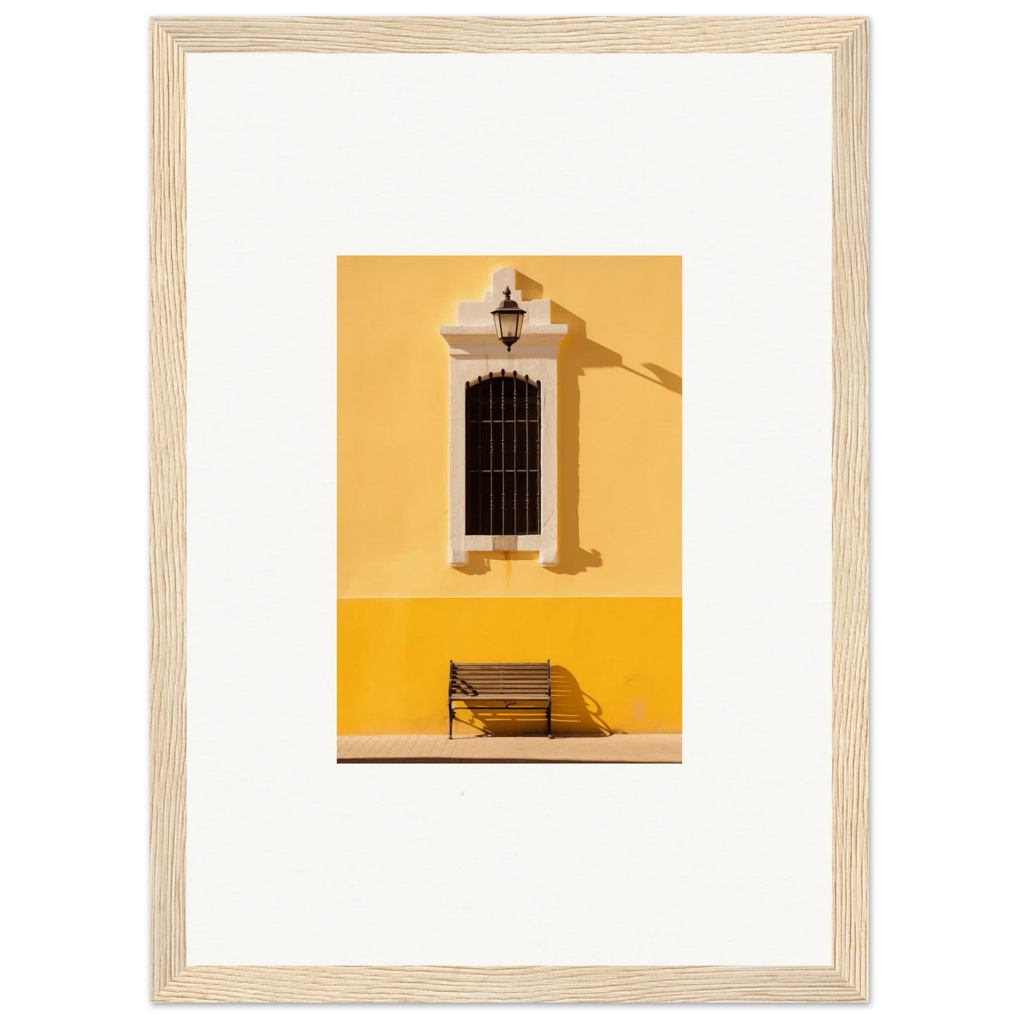 Framed photograph of a yellow wall with a bench perfect for Six-Light Cult Optionsky decor