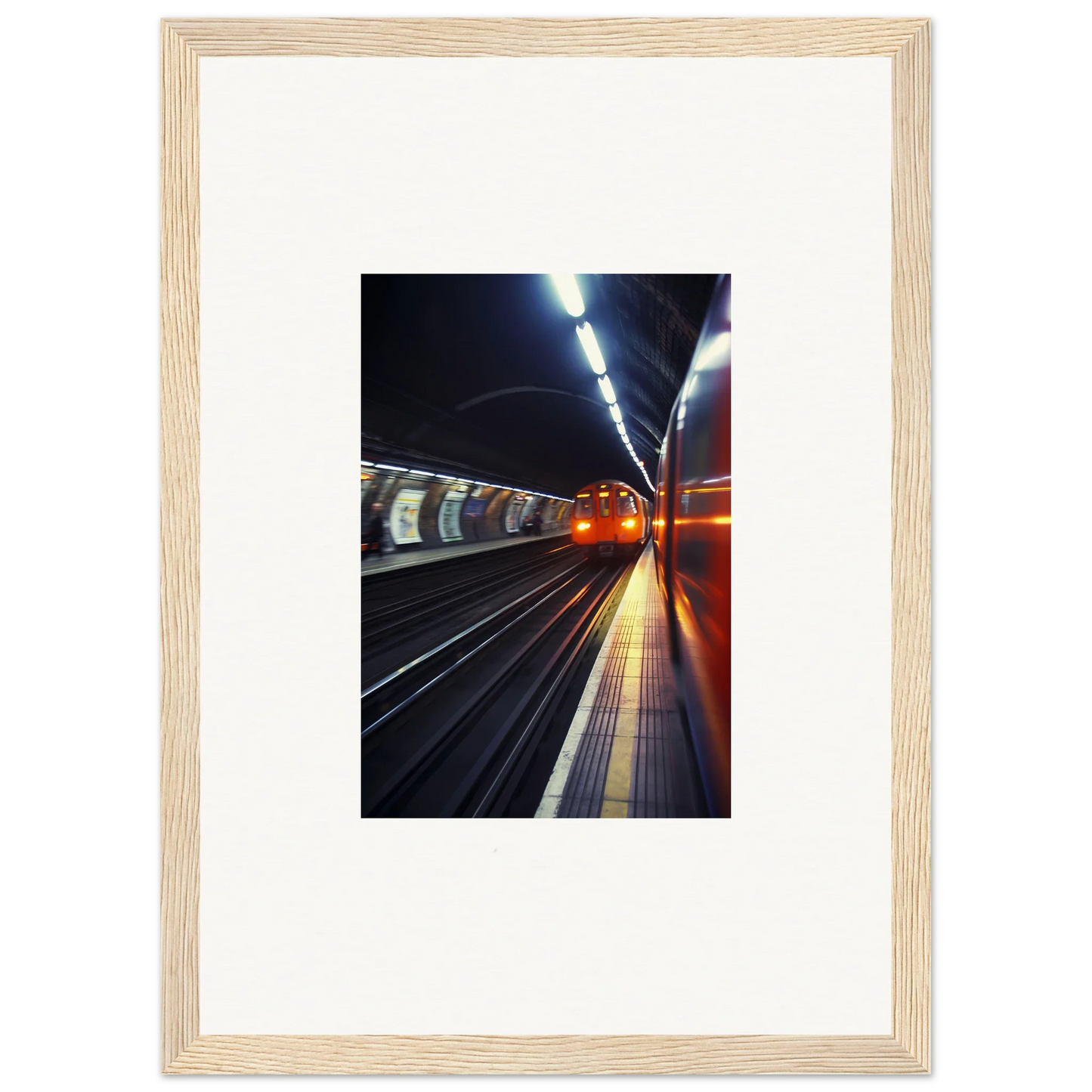 Framed photo of a night subway platform, showcasing Threads Passagesquent Hues