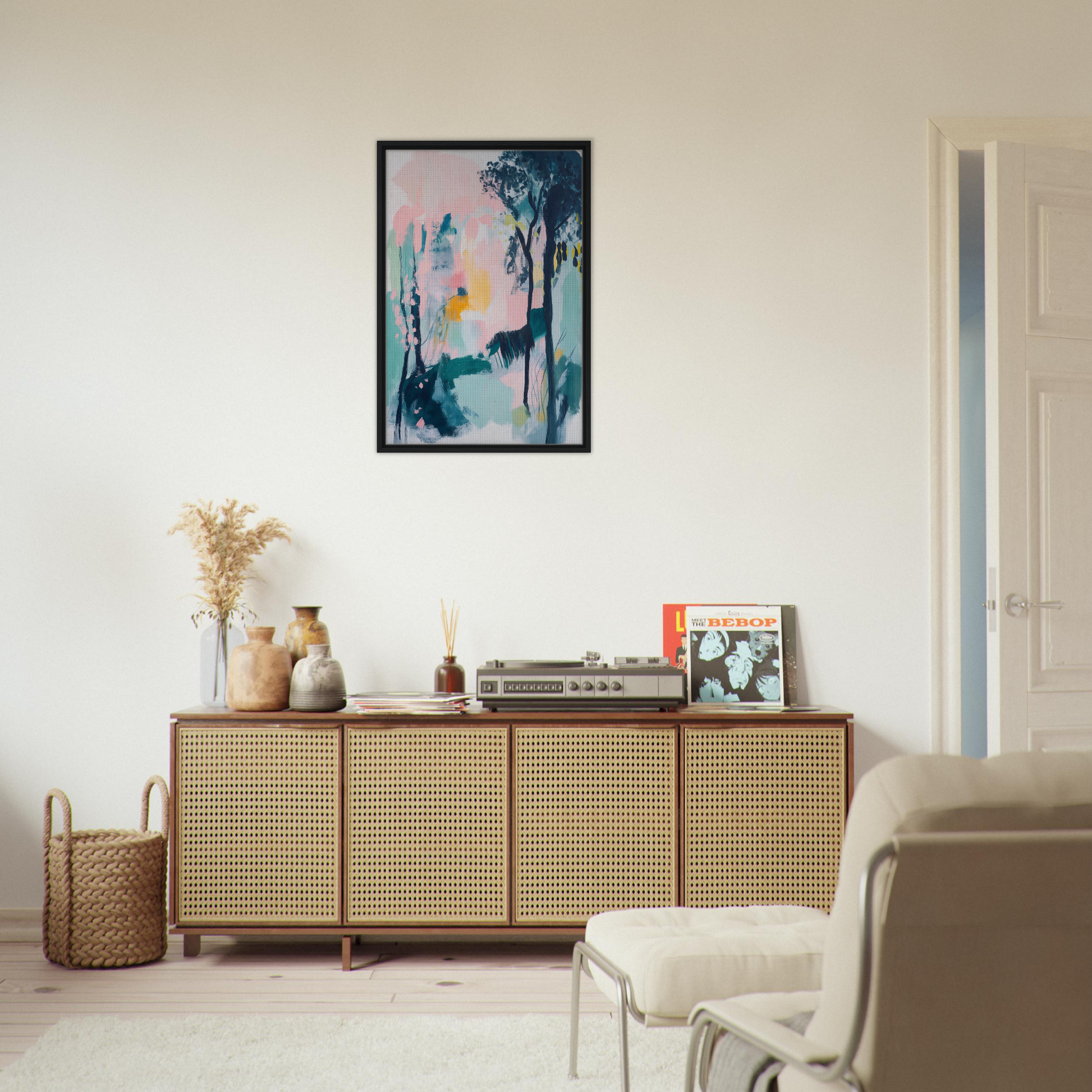 Wooden sideboard with cane-webbed doors and decorative items featuring Abstract Groves Dance