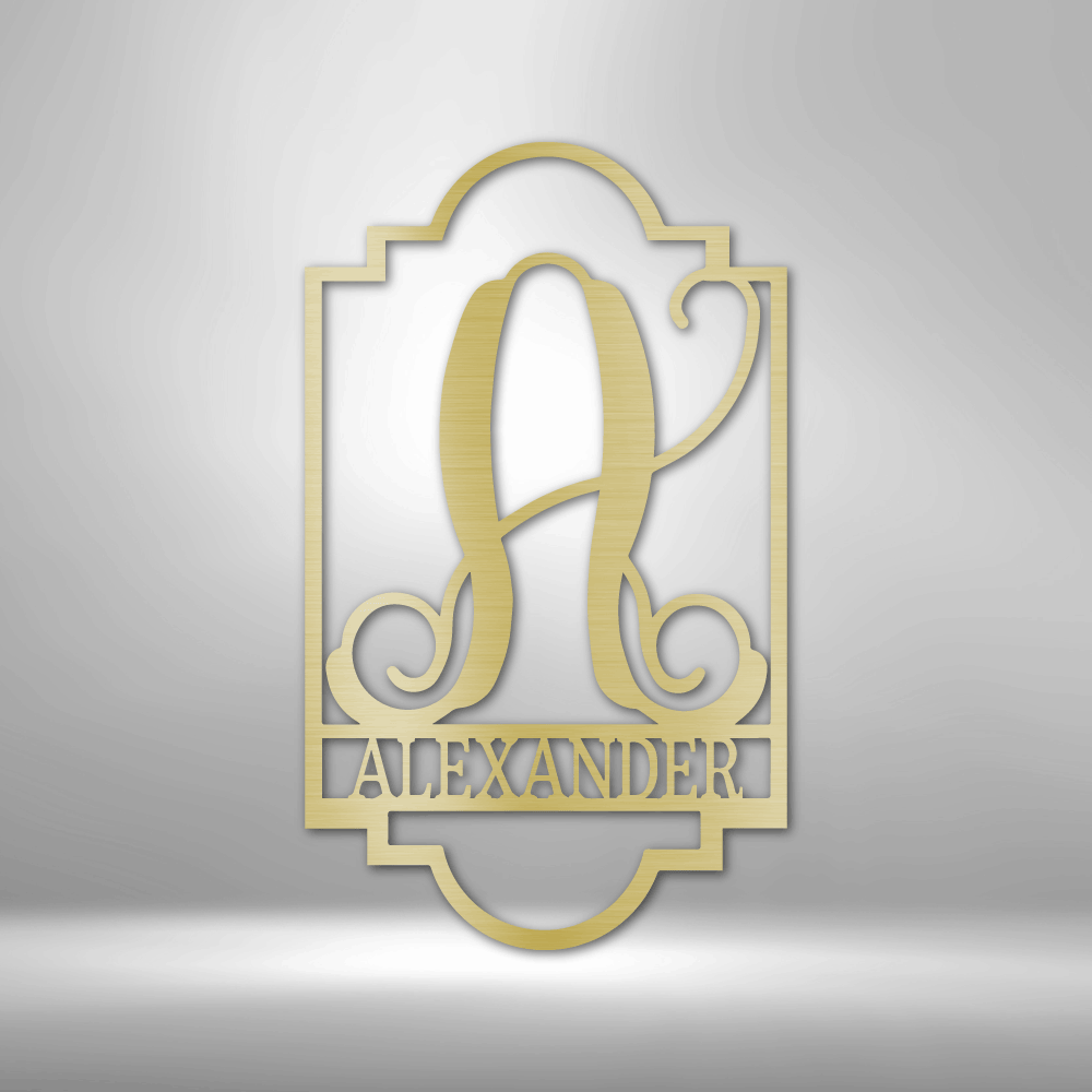 Ornate gold-colored monogram design featuring the letter ’A’ and the name ’Alexander’ in an elegant frame.