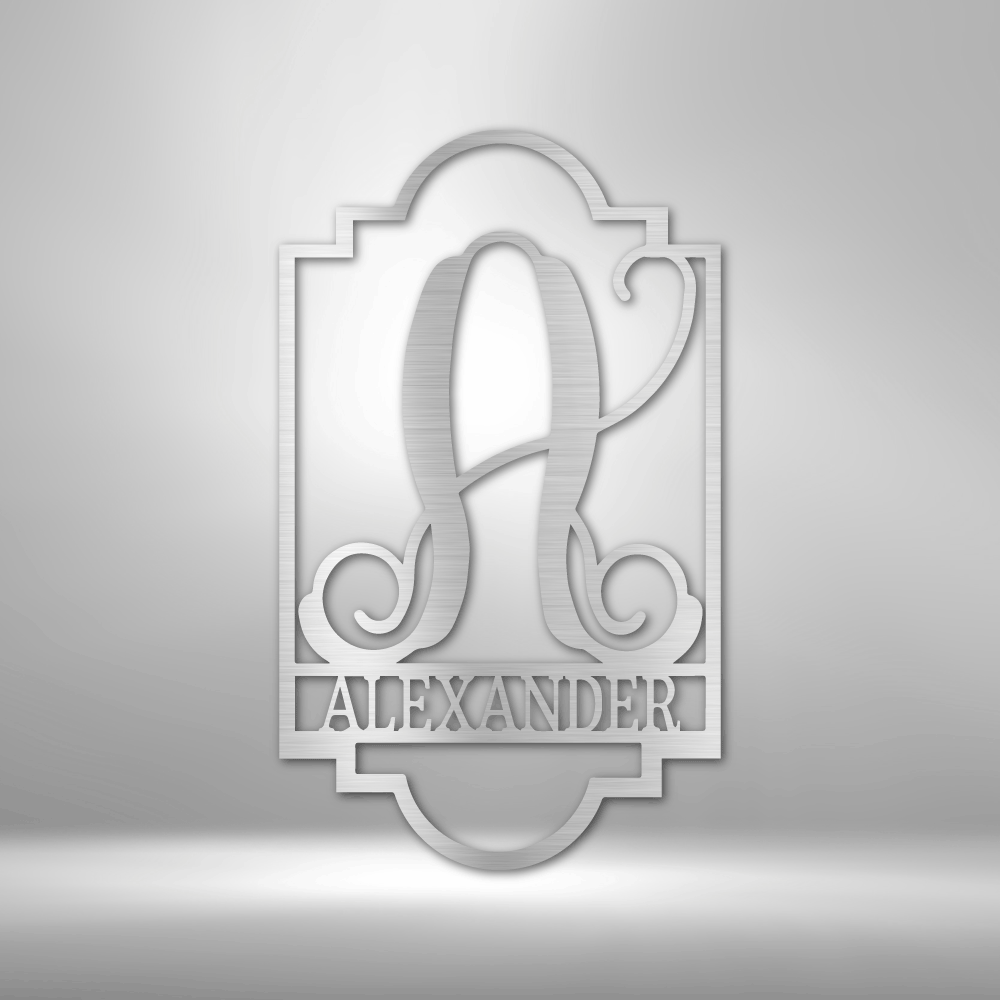Ornate monogram design featuring the letter ’A’ and the name ’Alexander’ in a decorative frame.
