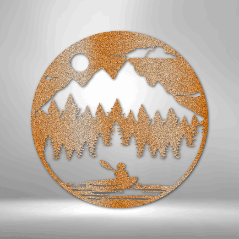 Circular wooden cutout depicting a mountain landscape with trees and a person in a canoe.