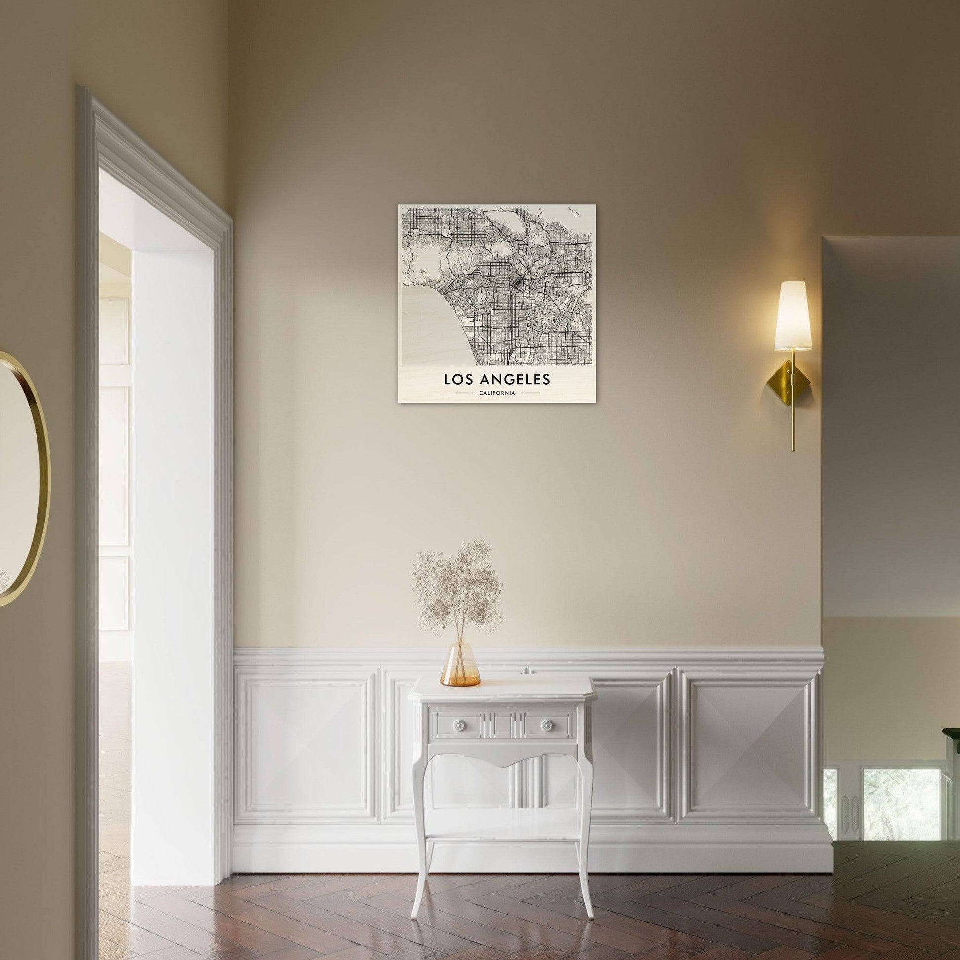White console table with curved legs against a wall.