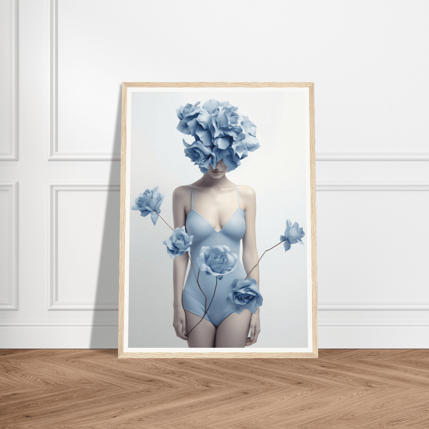 Framed surrealist artwork depicting a figure with blue floral elements replacing the head and adorning the body.