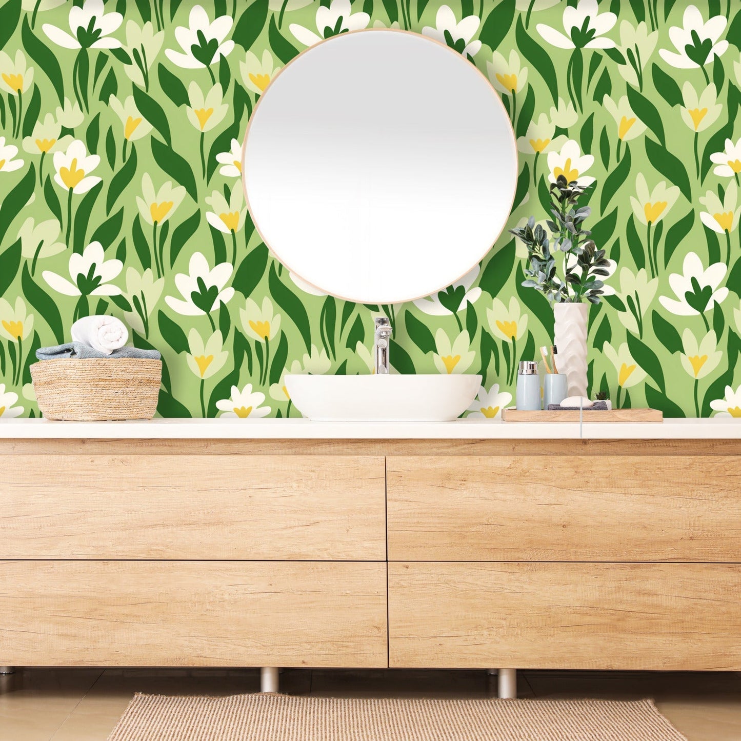 A bathroom with a green wallpaper and a white sink