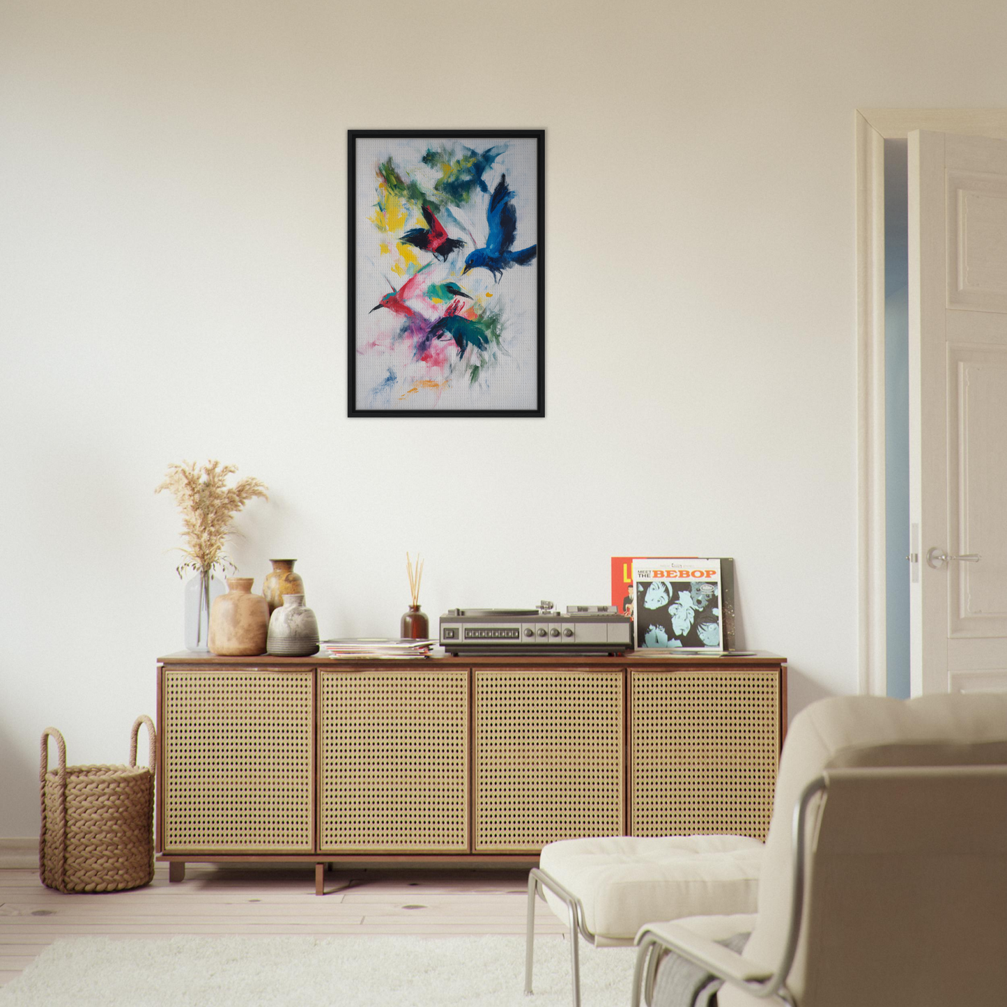 Wooden sideboard with rattan-fronted doors featuring Birds Chromatic Dance decor