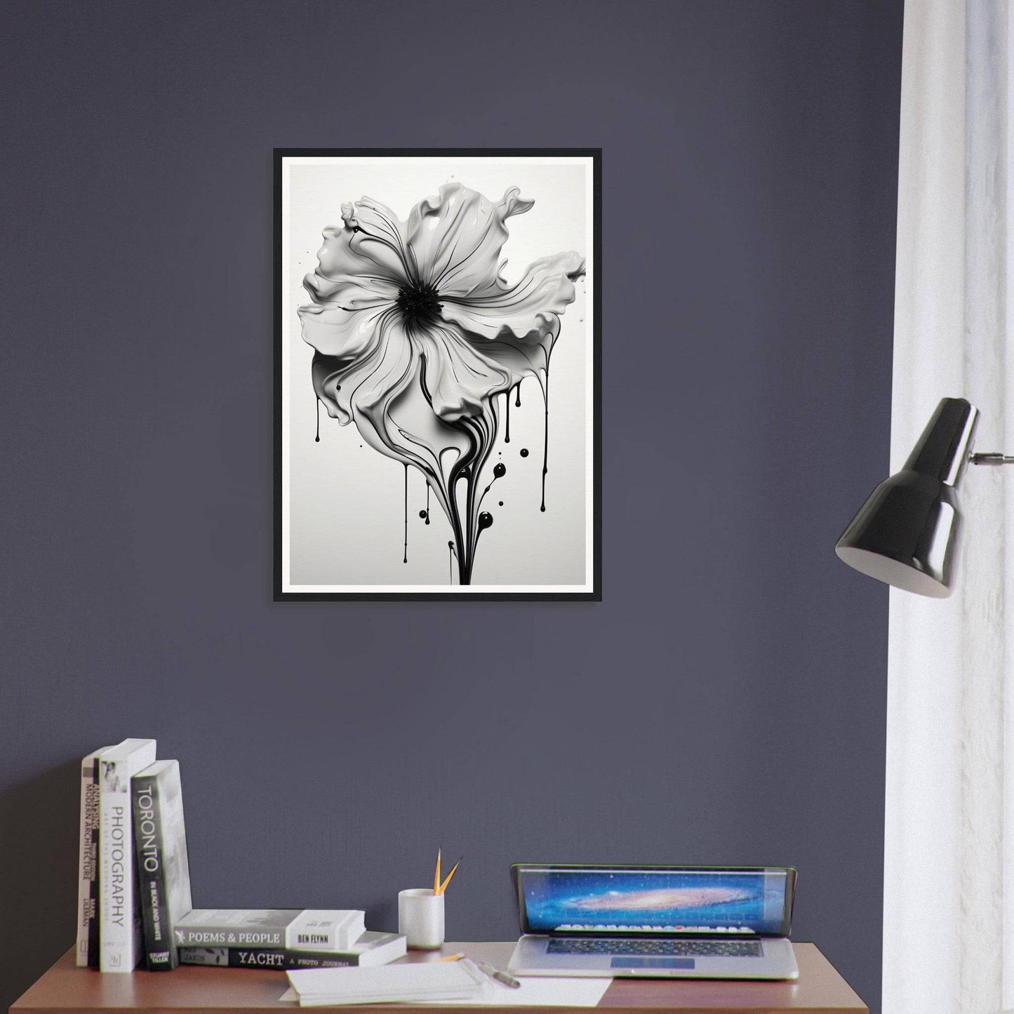 A black and white flower on a wall