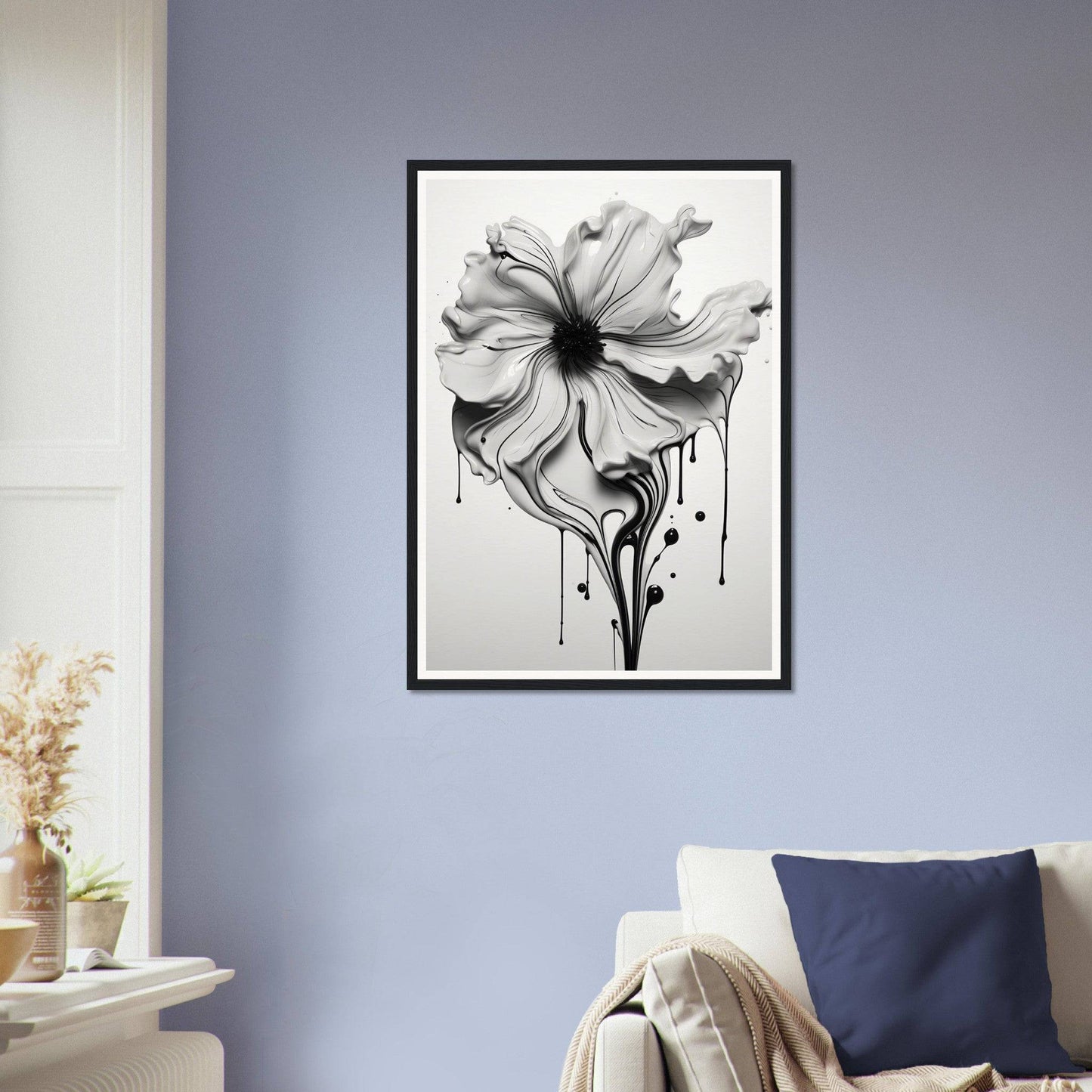 A black and white flower on a wall