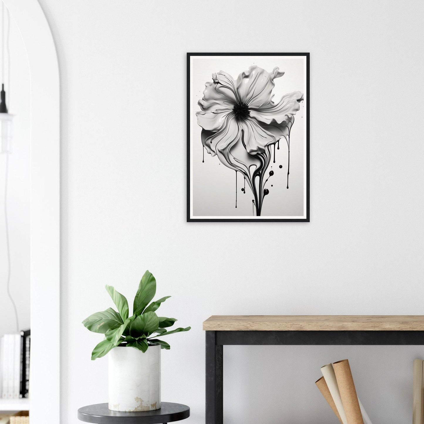 A black and white flower on a wall