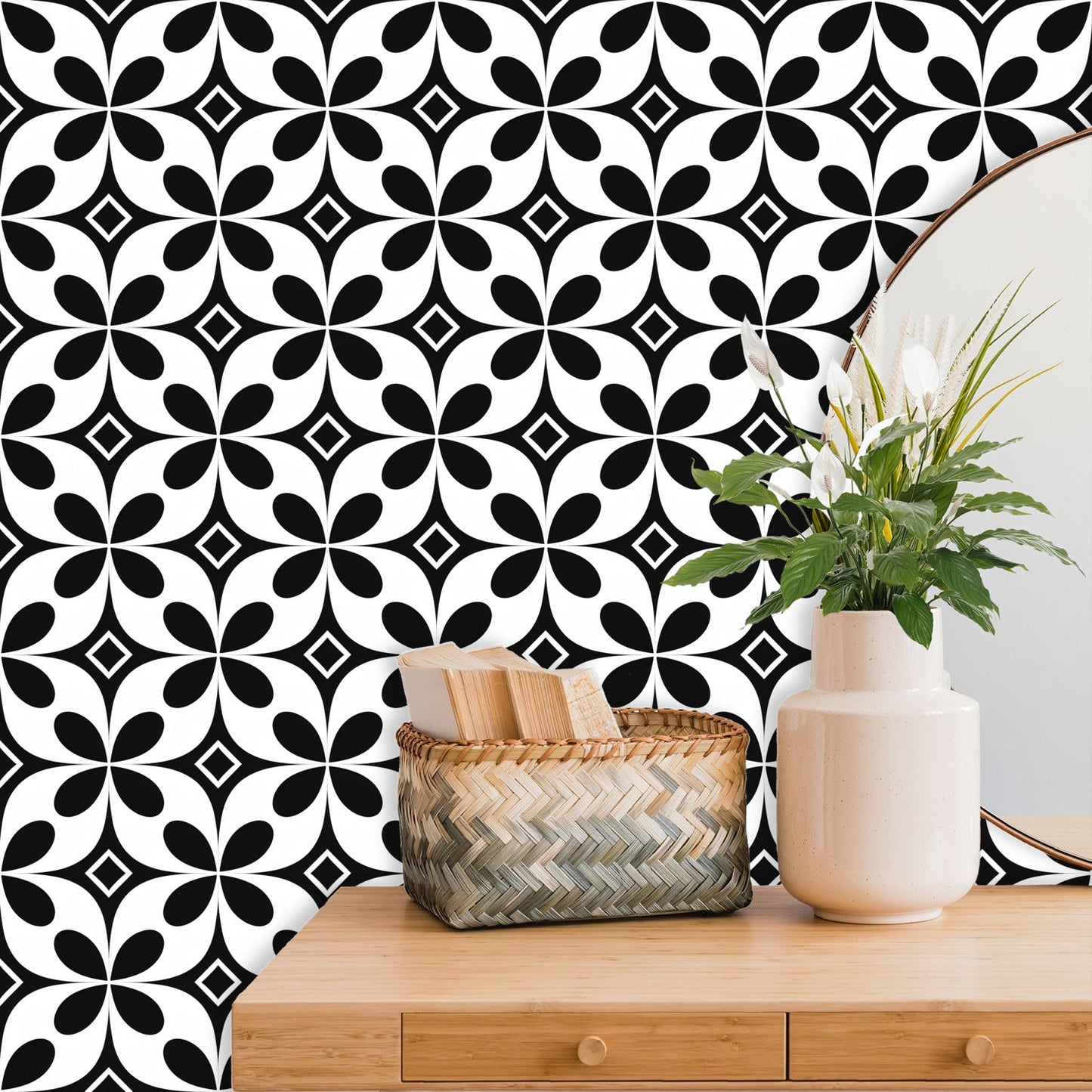 A black and white wallpaper with a geometric pattern