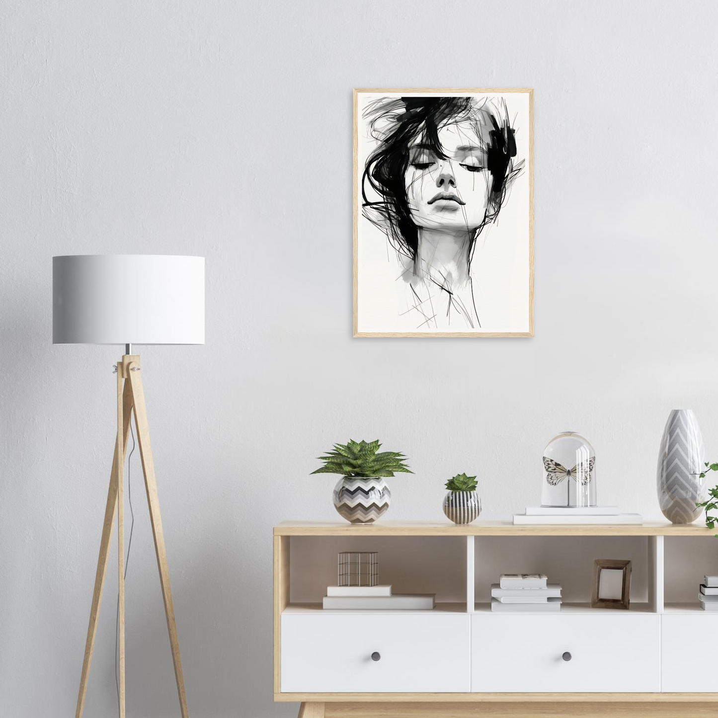 A black and white drawing of a woman’s face