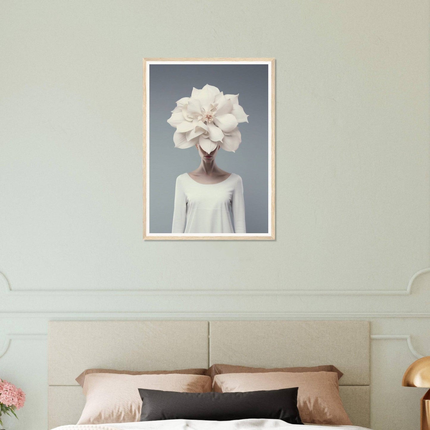 Framed surrealist artwork depicting a figure with a large white flower in place of their head.