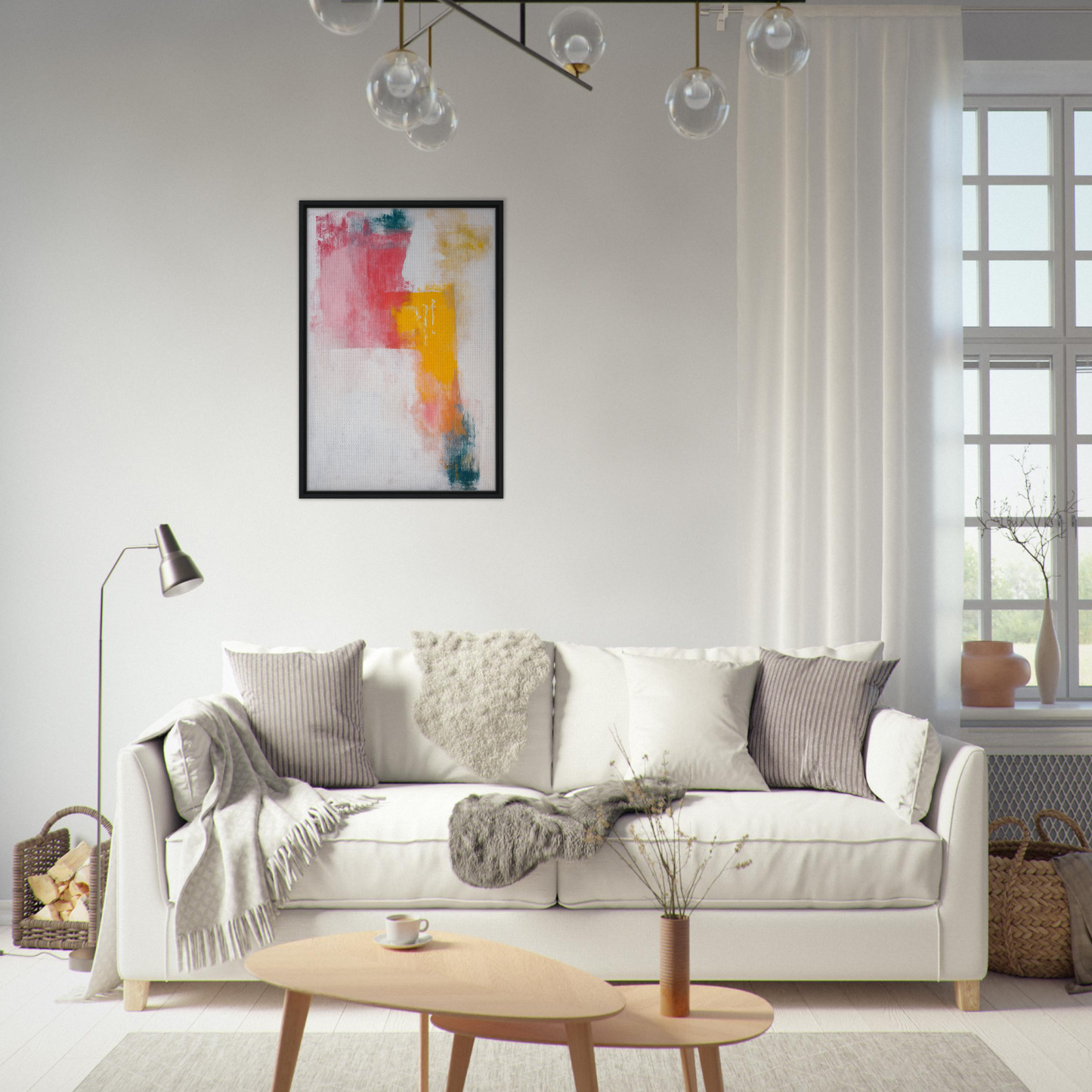 White sofa adorned with throw pillows and blankets from Chromatic Color Conflict collection