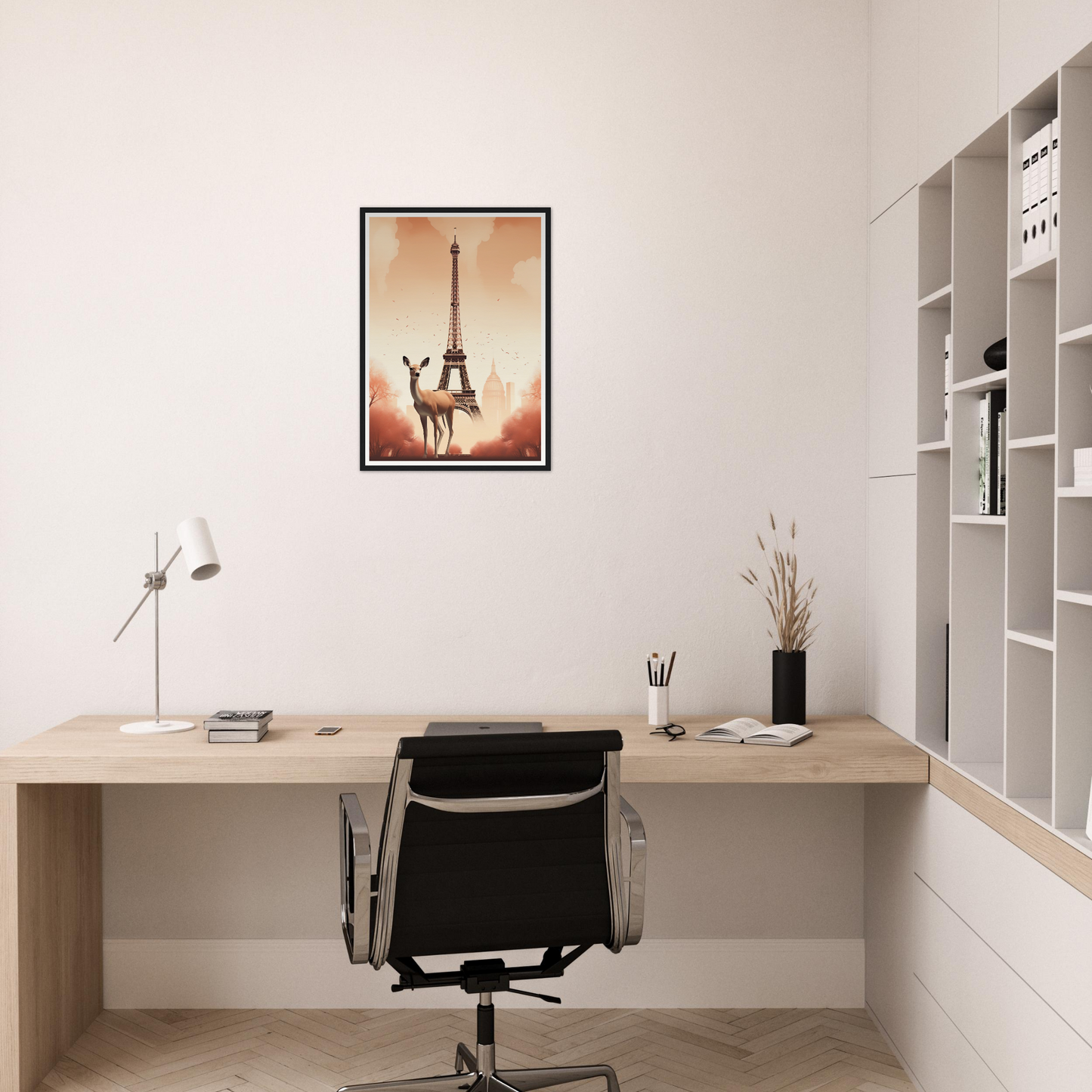 There is a desk with a chair and a picture on the wall