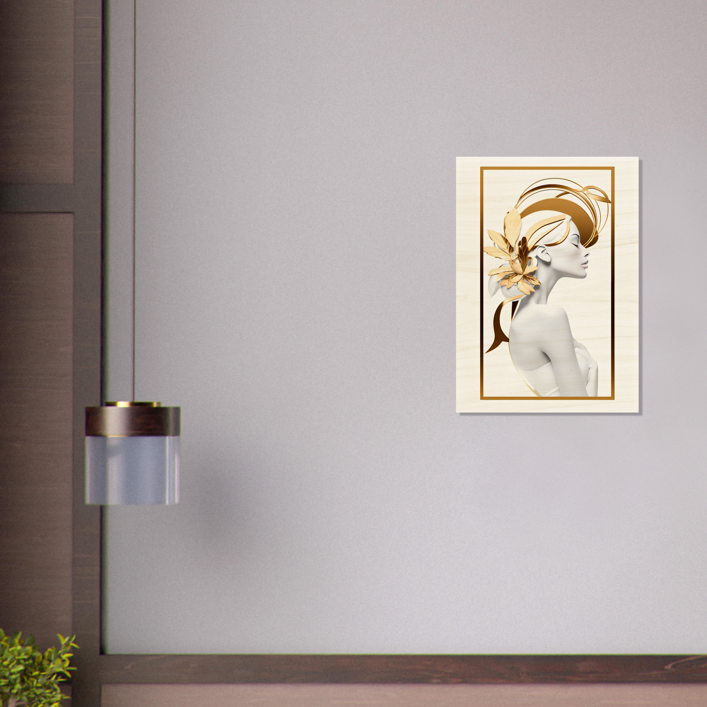 Framed artwork depicting a stylized female figure with golden accents.
