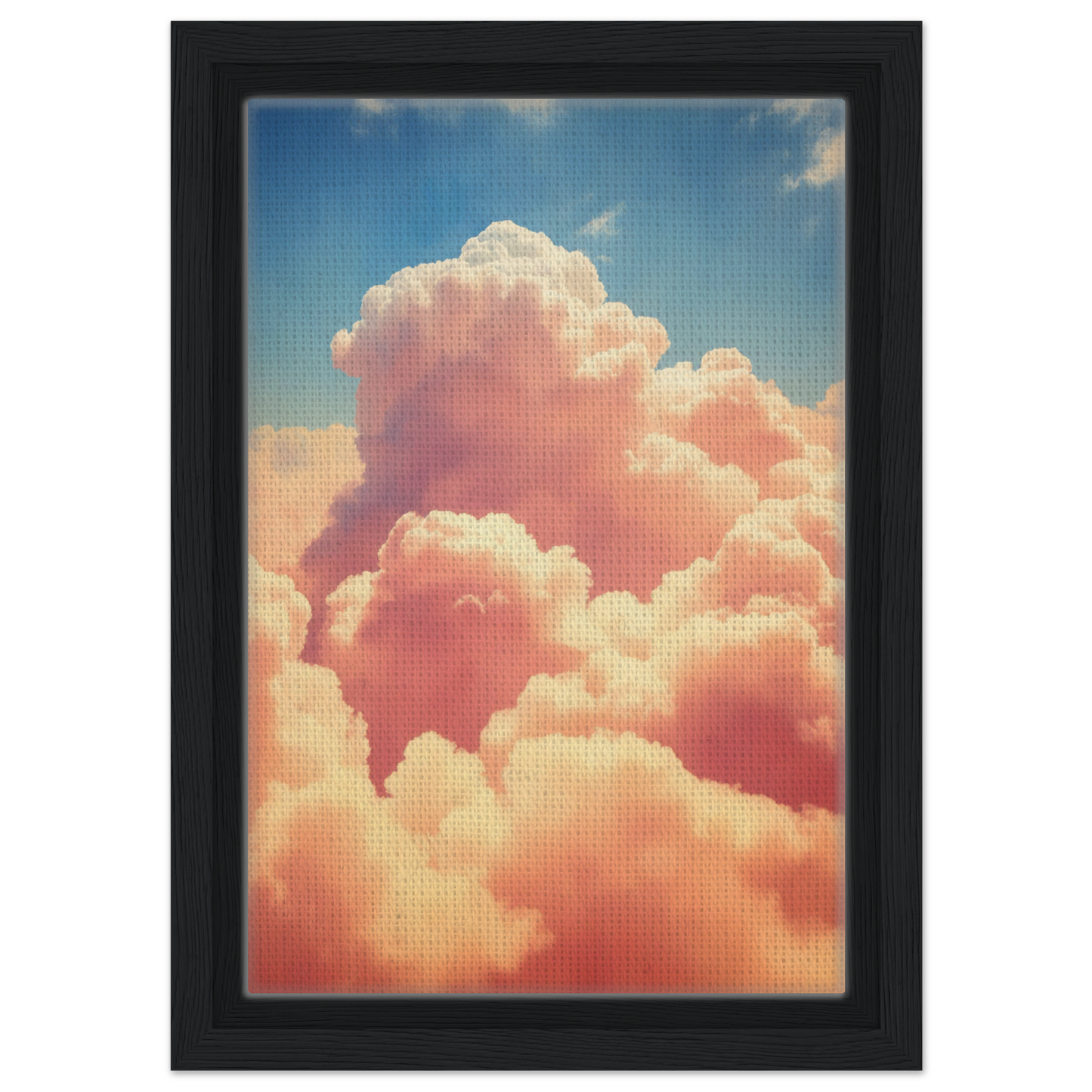 Fluffy pink clouds bathed in sunlight against a blue sky for Exquisitions Ecstatic Sky