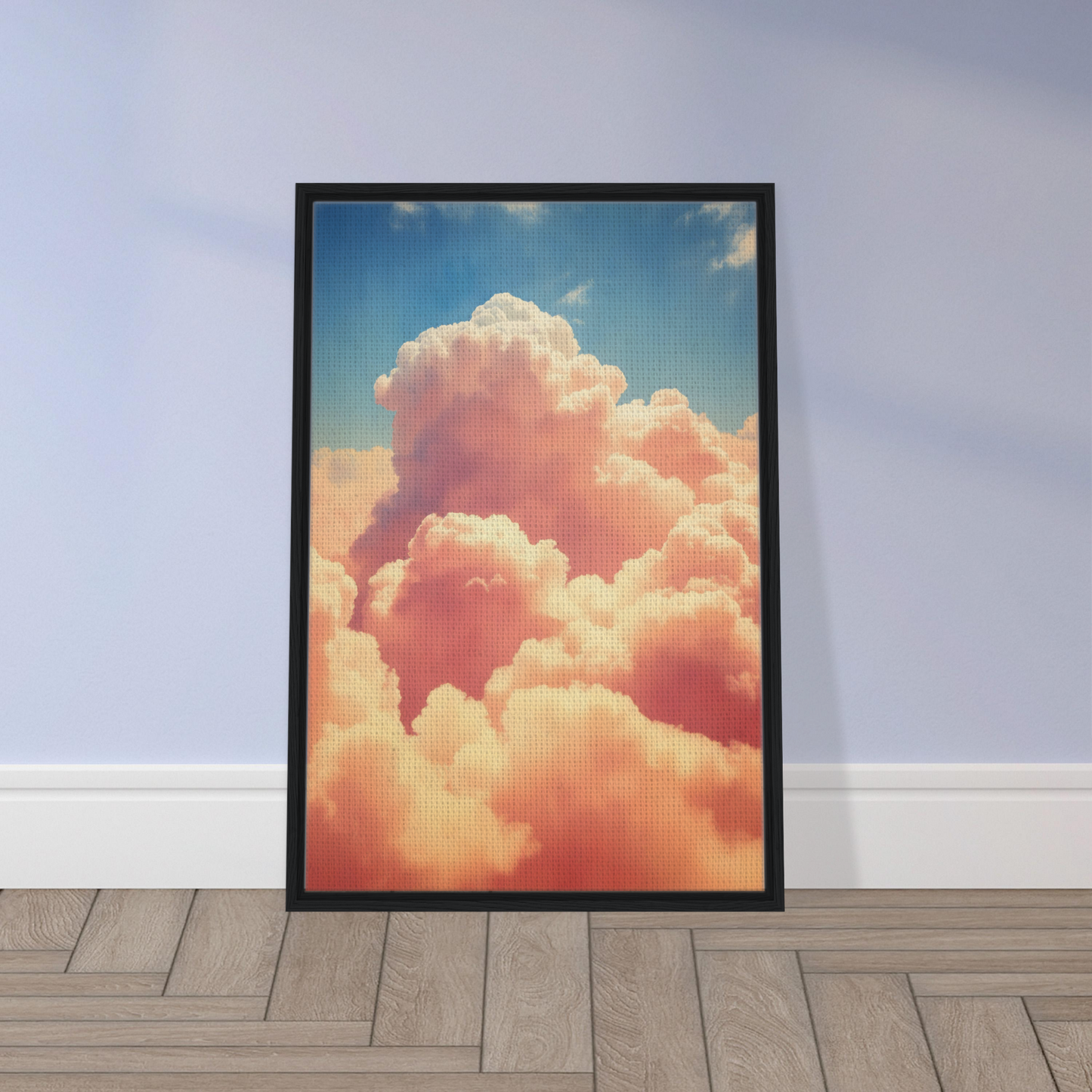 Fluffy pink clouds against a blue sky in Exquisitions Ecstatic Sky framed decor