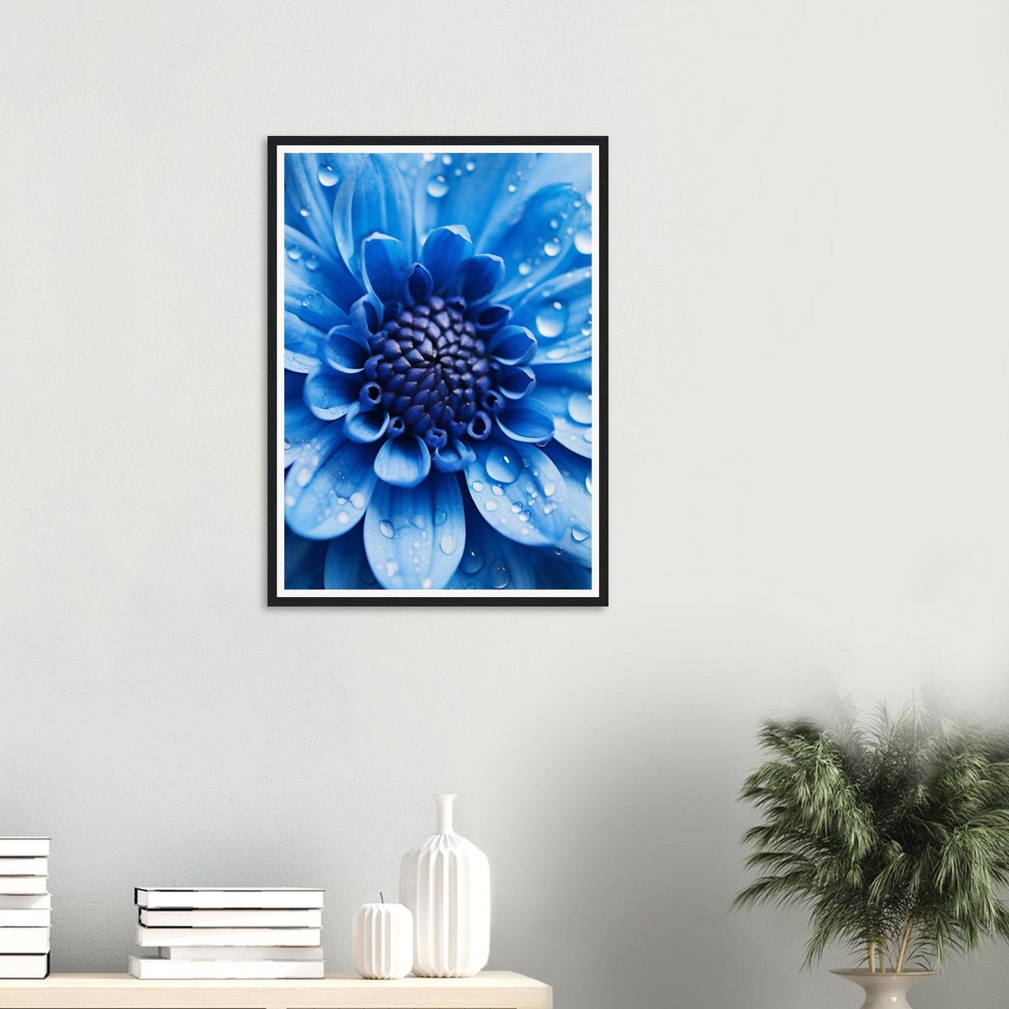 Framed photograph of a vibrant blue flower with water droplets on its petals.
