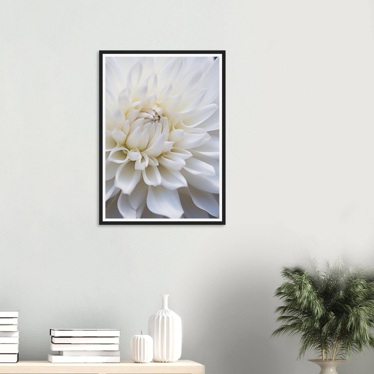 Framed photograph of a white dahlia flower in close-up.