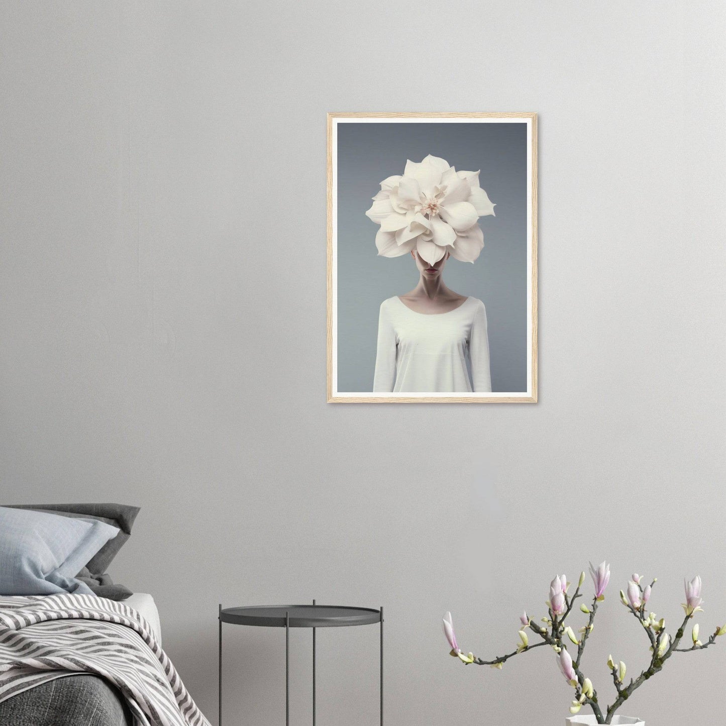 Framed surrealist artwork depicting a figure with a large white flower in place of their head.