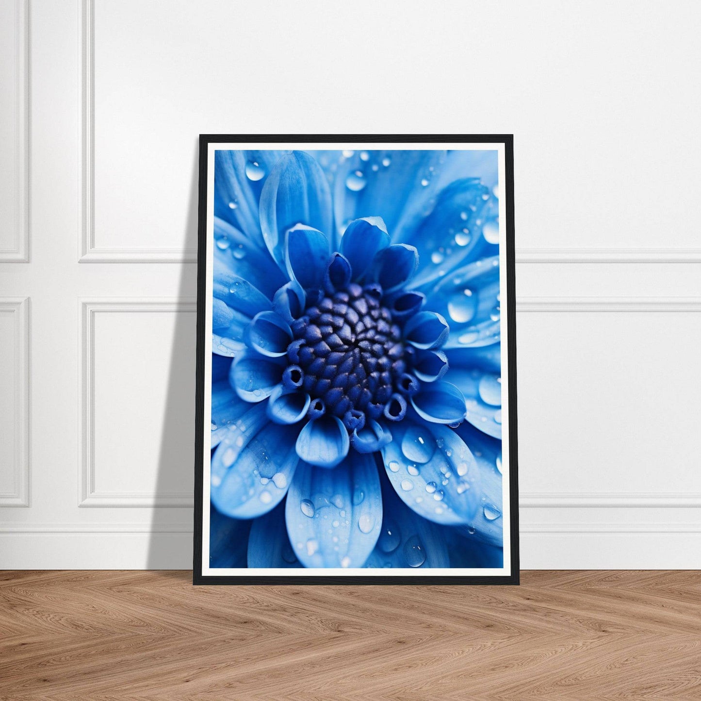 Vibrant blue flower with water droplets in a framed photograph.