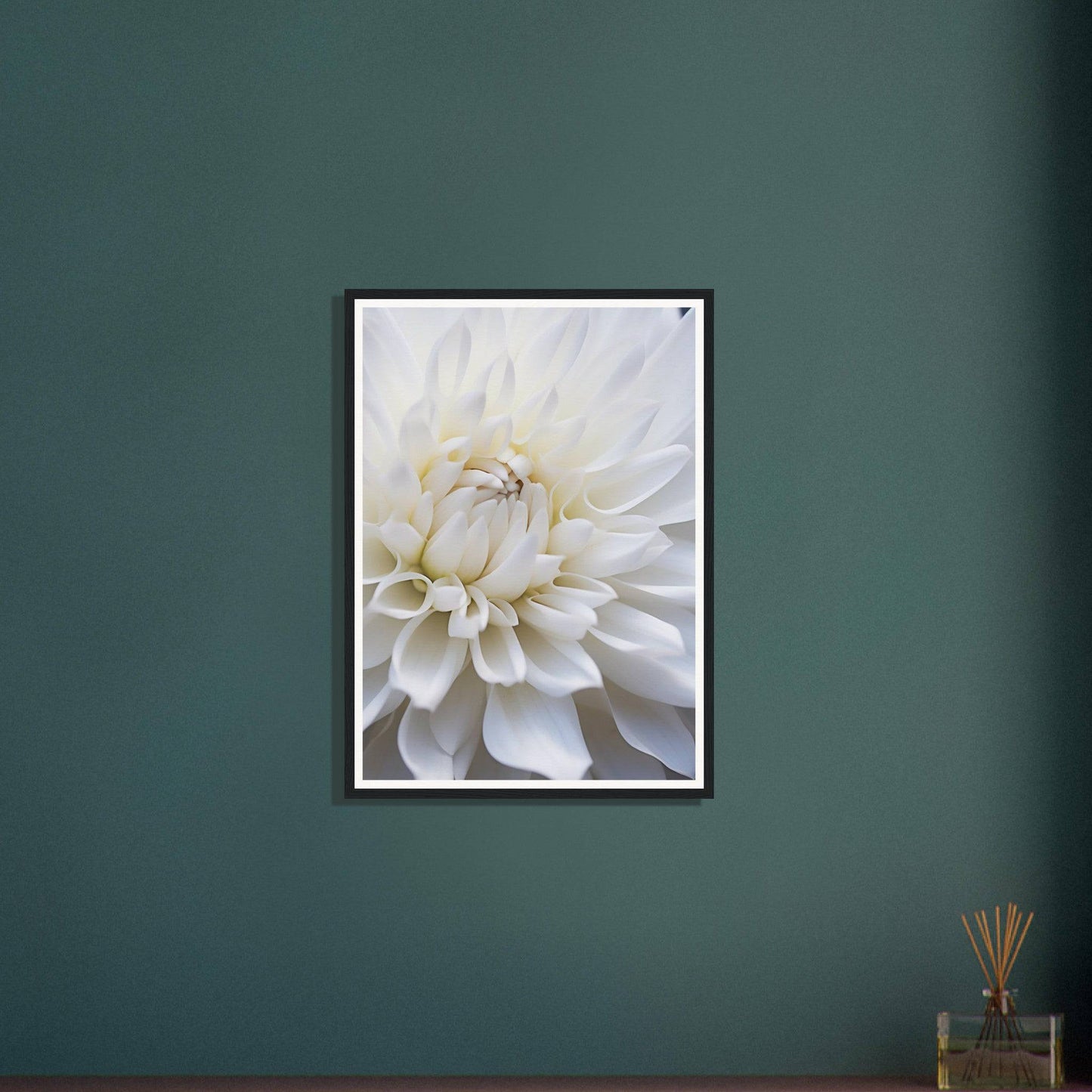 Framed photograph of a white dahlia flower in close-up.