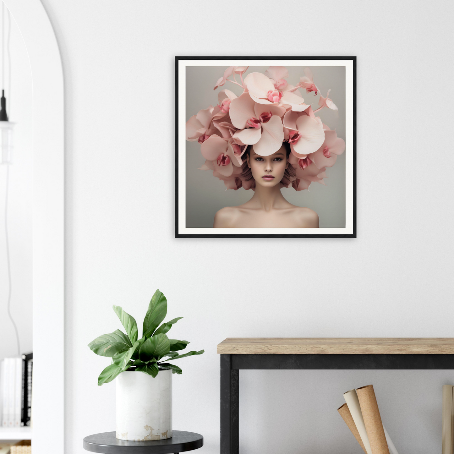 Framed portrait of a person wearing an elaborate pink floral headdress.